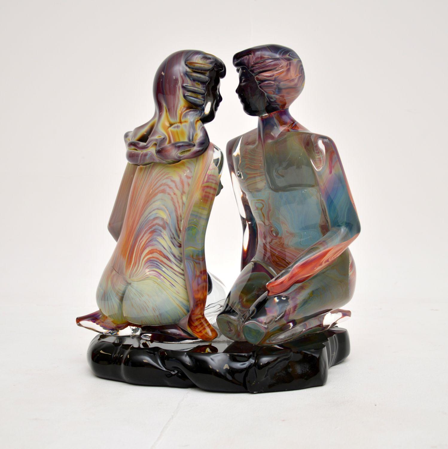 An exquisite Italian Murano glass sculpture of two young lovers. This is by artist Dino Rosin, it dates from the late twentieth century.

The level of craftsmanship is outstanding, this is beautifully made with incredible colours and patterns.

The