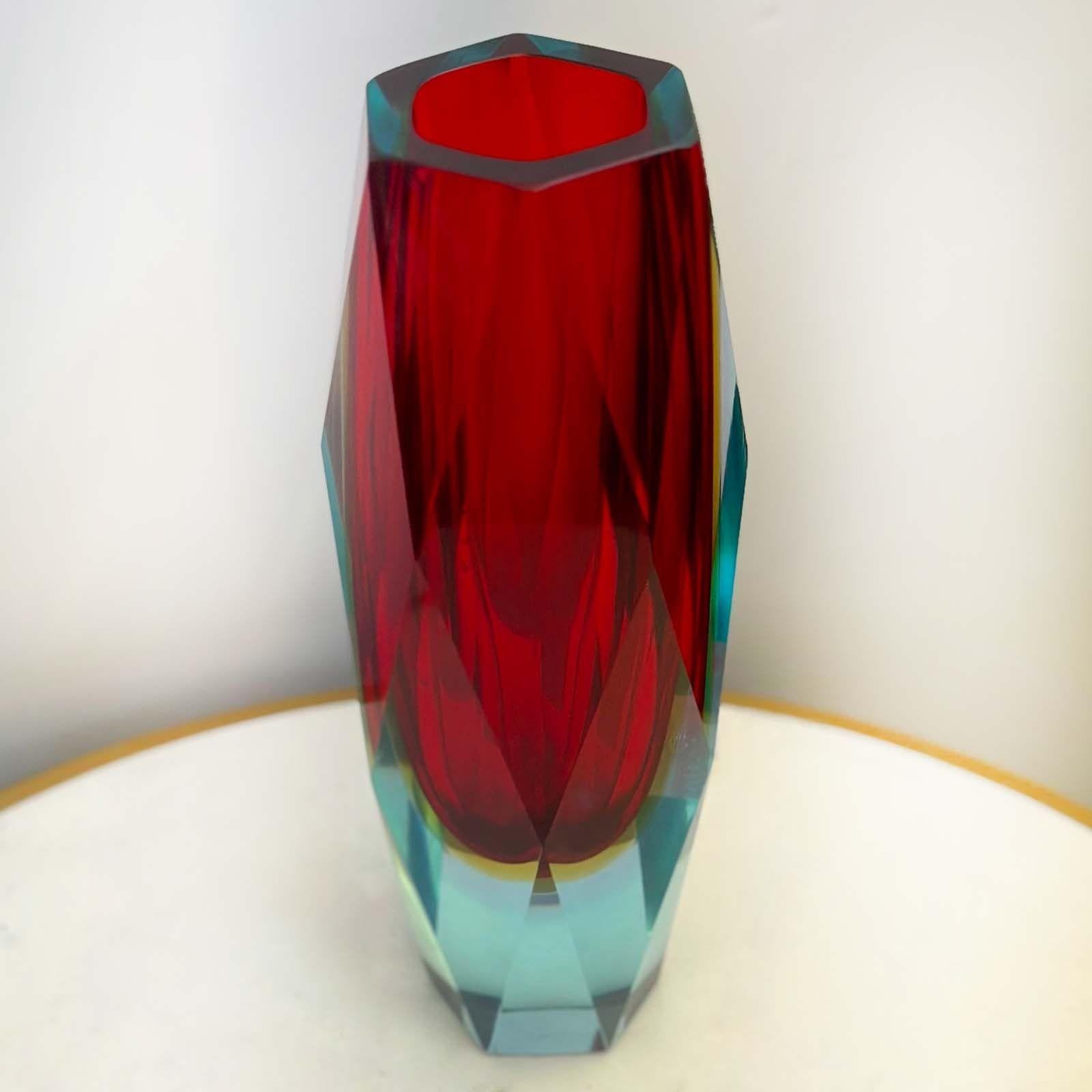 Single red, blue and yellow Murano glass vase with unique geometric shape. Made in Italy, c. 1960's.
Dimensions:
10.25