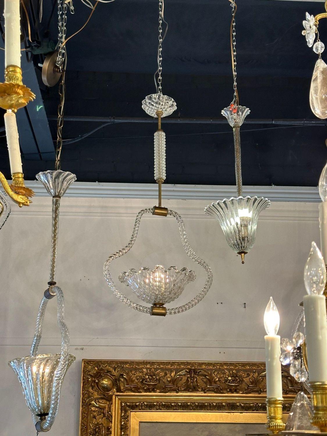 Vintage Italian Murano glass and brass pendant after Barovier. Circa 1960. The chandelier has been professionally re-wired, cleaned and is ready to hang.