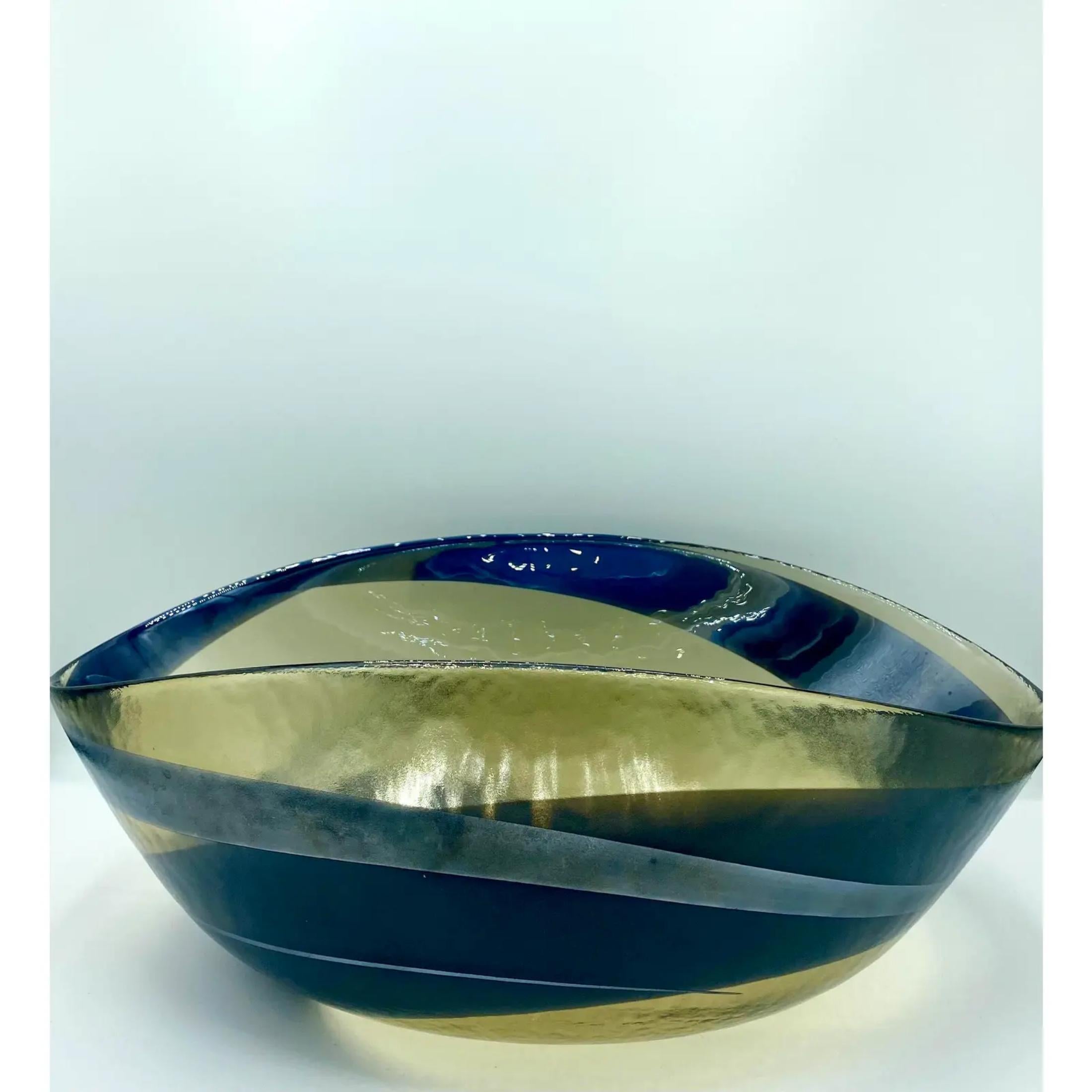 Stunning vintage Murano Seguso glass bowl. Made in Italy. Tagged with the Murano logo tag. Beautiful blue swirl on a clean background. A vintage bowl with a contemporary loo