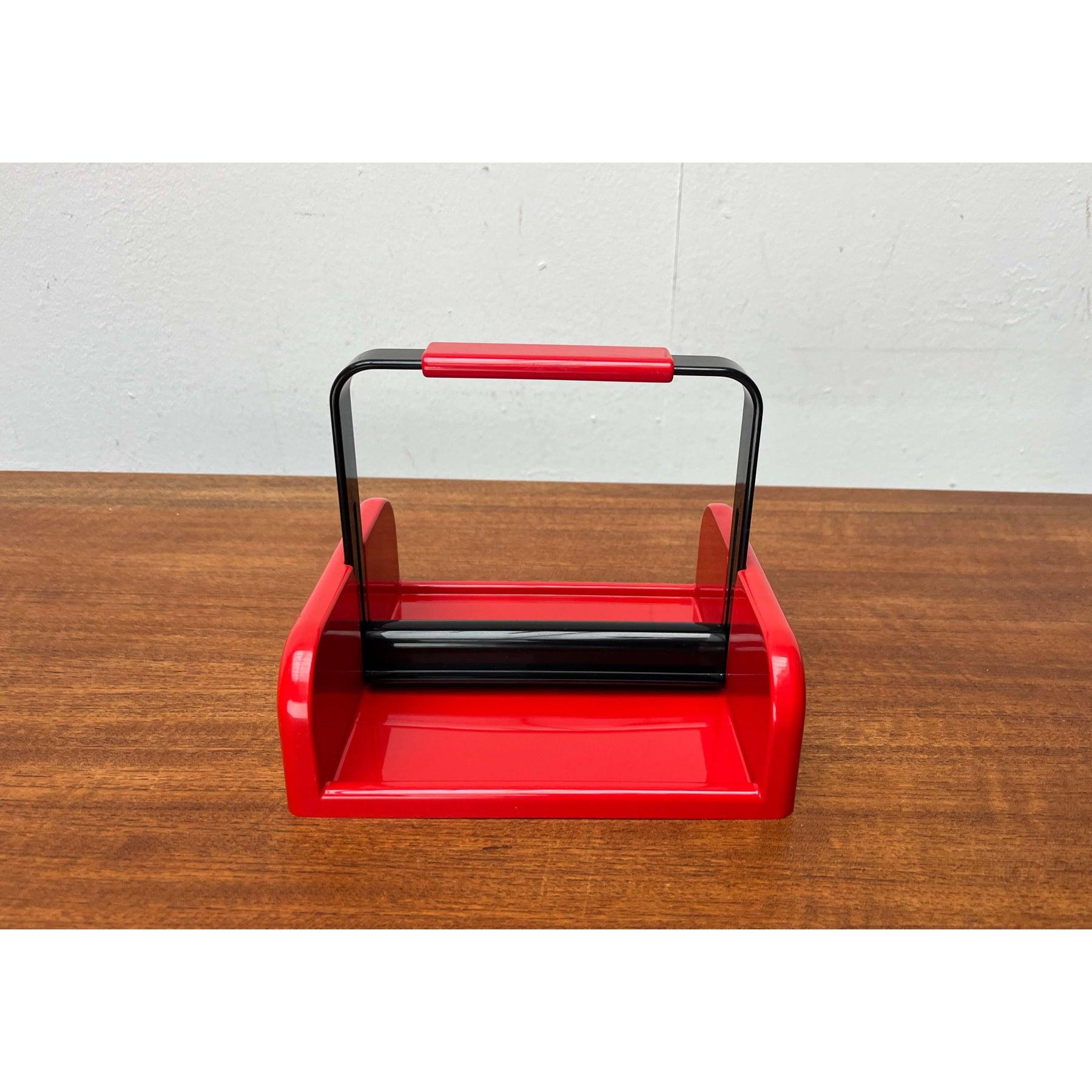 Vintage Italian Napkin Holder from Scaroni, 1980s, in Very Good conditions. Designed 1980 to 1989 This piece has an attribution mark,

Additional information:
Materials: Plastic
Color: Black
Period: 1980s
Country of Origin: Italy
Item Type: Vintage,