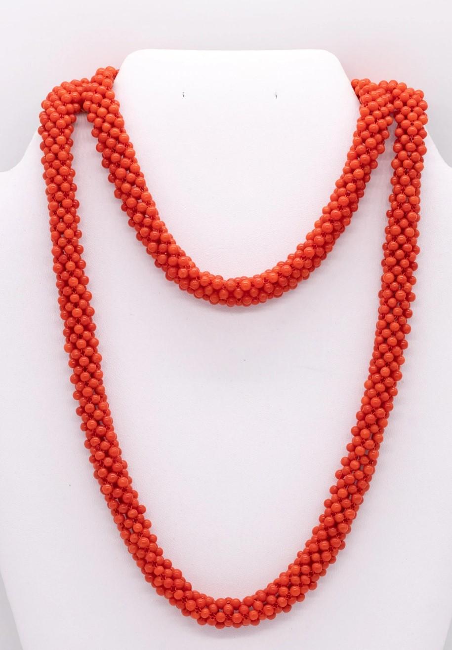 Long sautoir necklace with Sardinian red coral.

Beautiful modernist piece composed by a mesh of numerous beads (3 mm) carved from natural Sardinian Italian red coral. It is suited at the ends, with two spheres and a hook lock. crafted in 18 karats