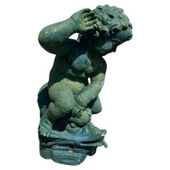 Used Italian Neoclassical Cement Cherub and Dolphin Garden Water Fountain