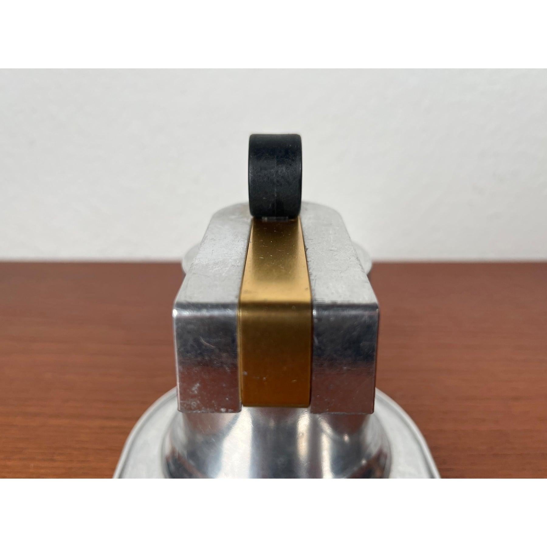 Vintage Italian Nuova Mignon Espresso Maker by Luigi Bialetti for Bialetti, 1960s, in Very Good conditions. Designed 1960 to 1969 This piece has an attribution mark.

Additional information:
Materials: Metal, Plastic
Color: Black
Styles: Mid-Century