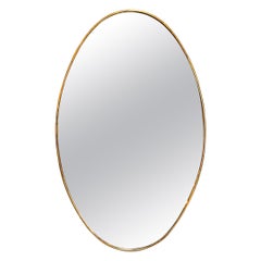 Specchio da parete ovale italiano vintage in ottone anni '70