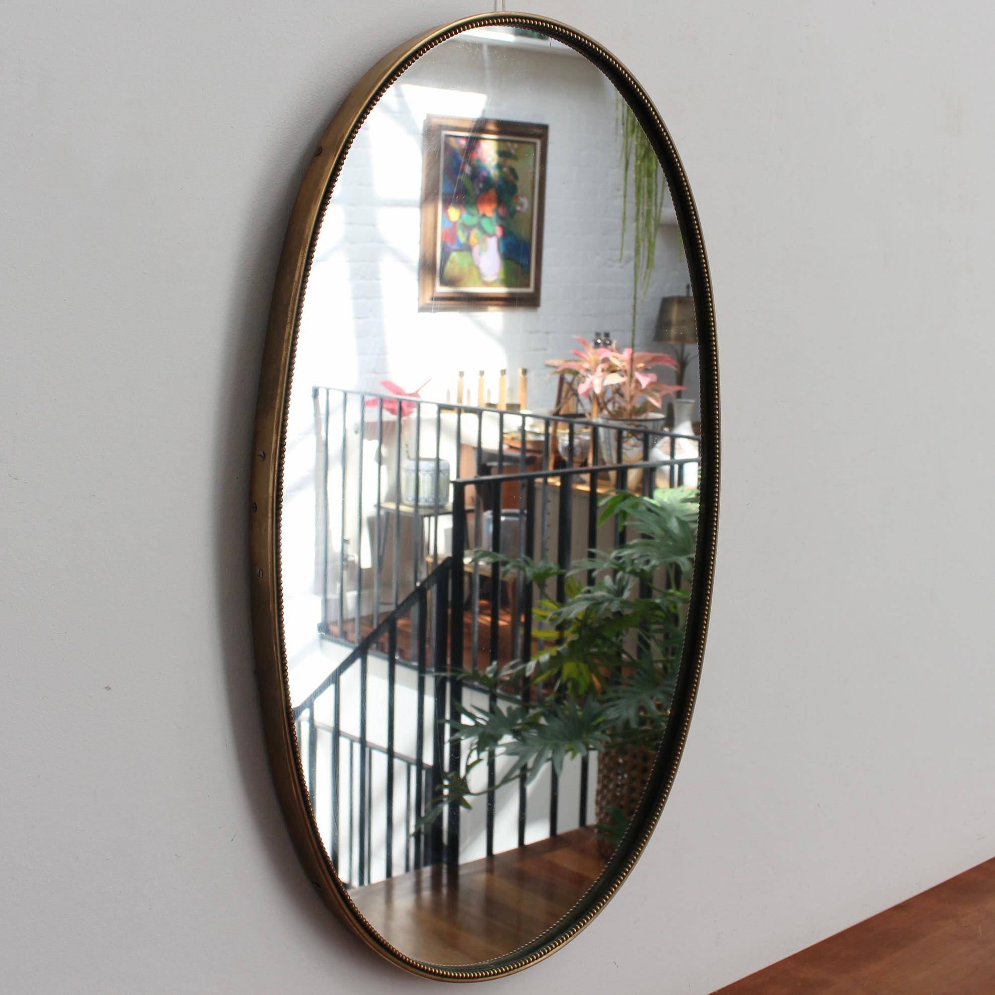 Mid-Century Modern Vintage Italian Oval Wall Mirror with Brass Frame and Beading (circa 1950s) For Sale