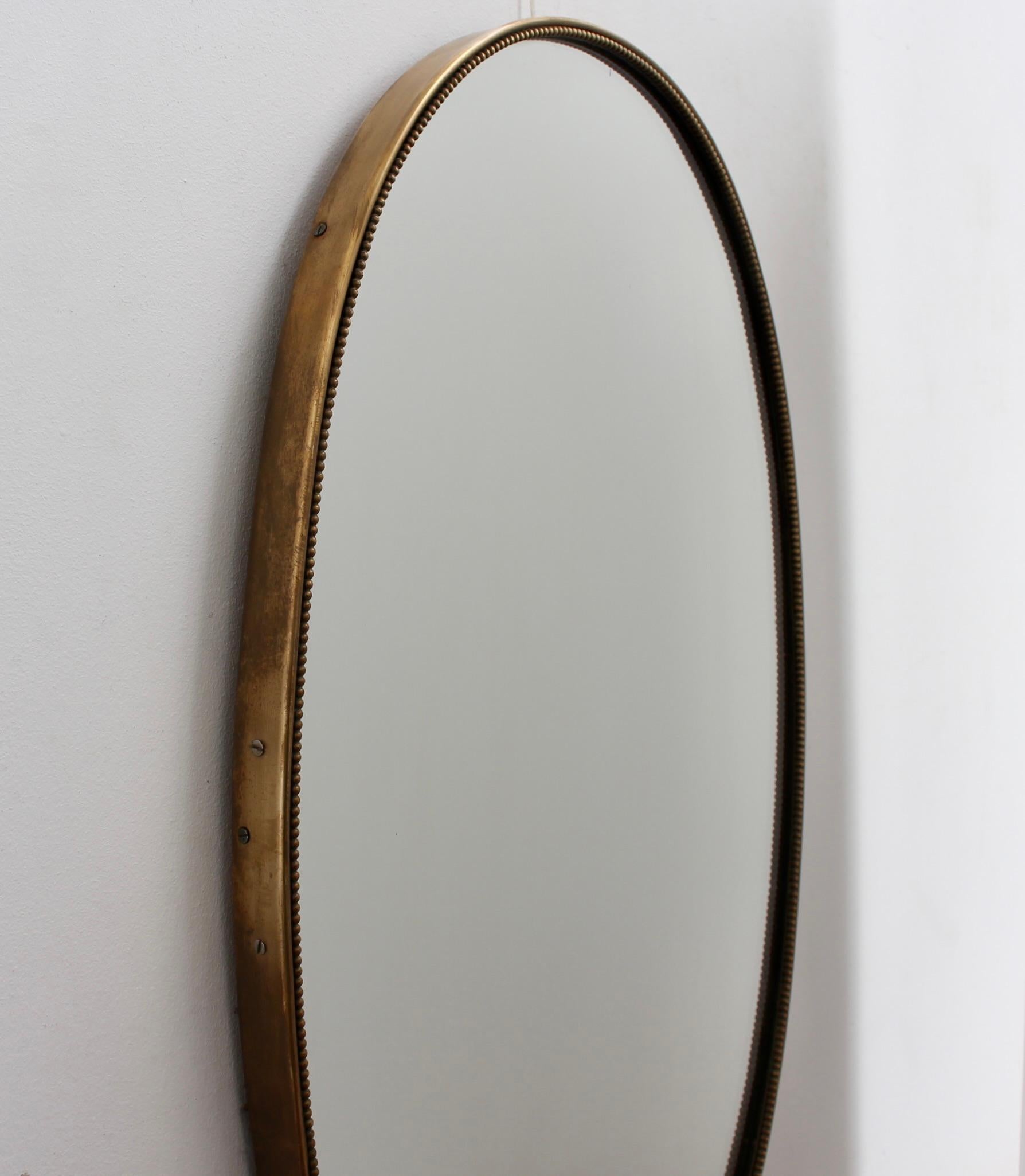 Mid-20th Century Vintage Italian Oval Wall Mirror with Brass Frame and Beading (circa 1950s) For Sale
