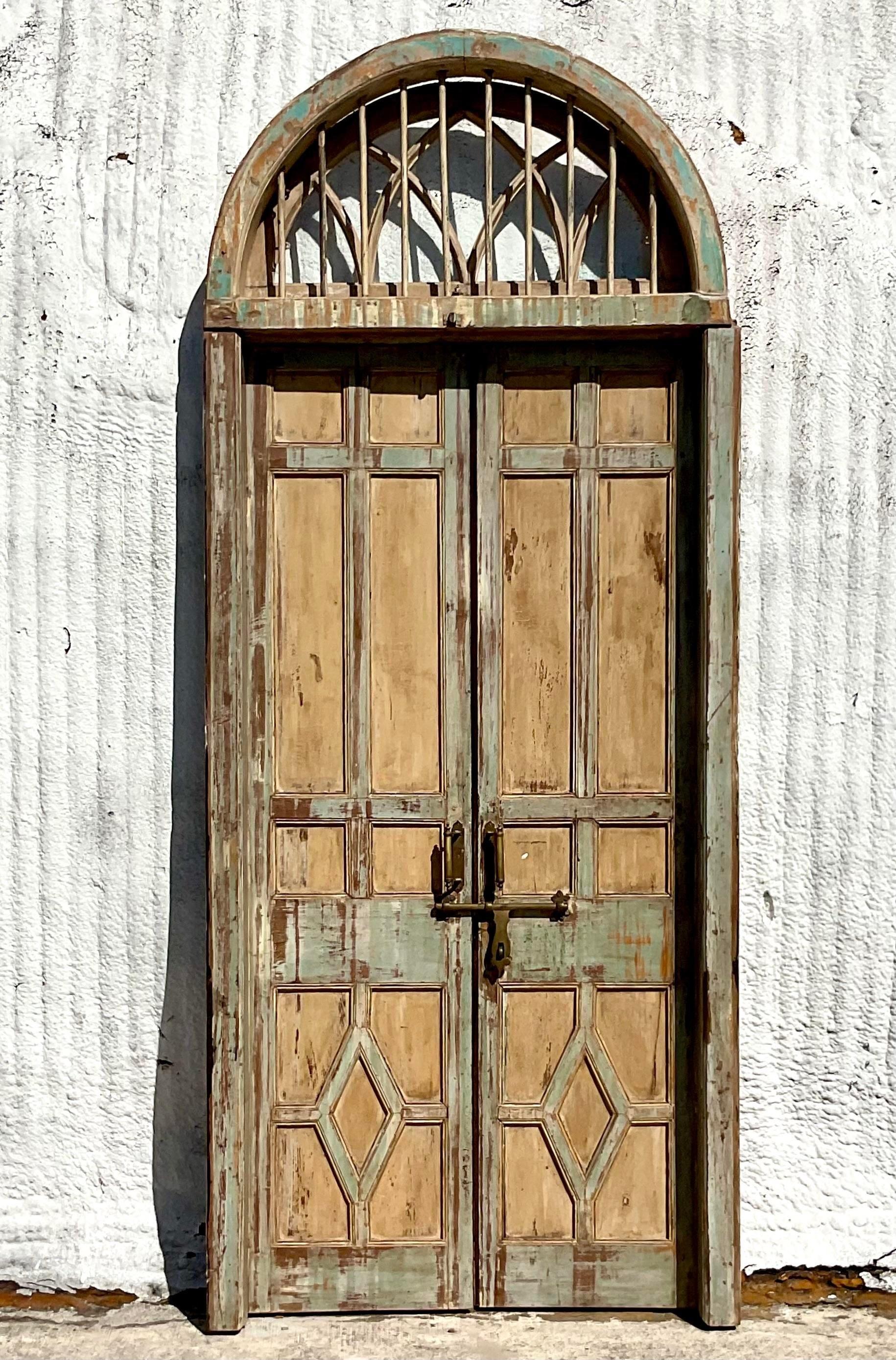 20th Century Vintage Italian Patinated Doors with Coordinating Transom For Sale