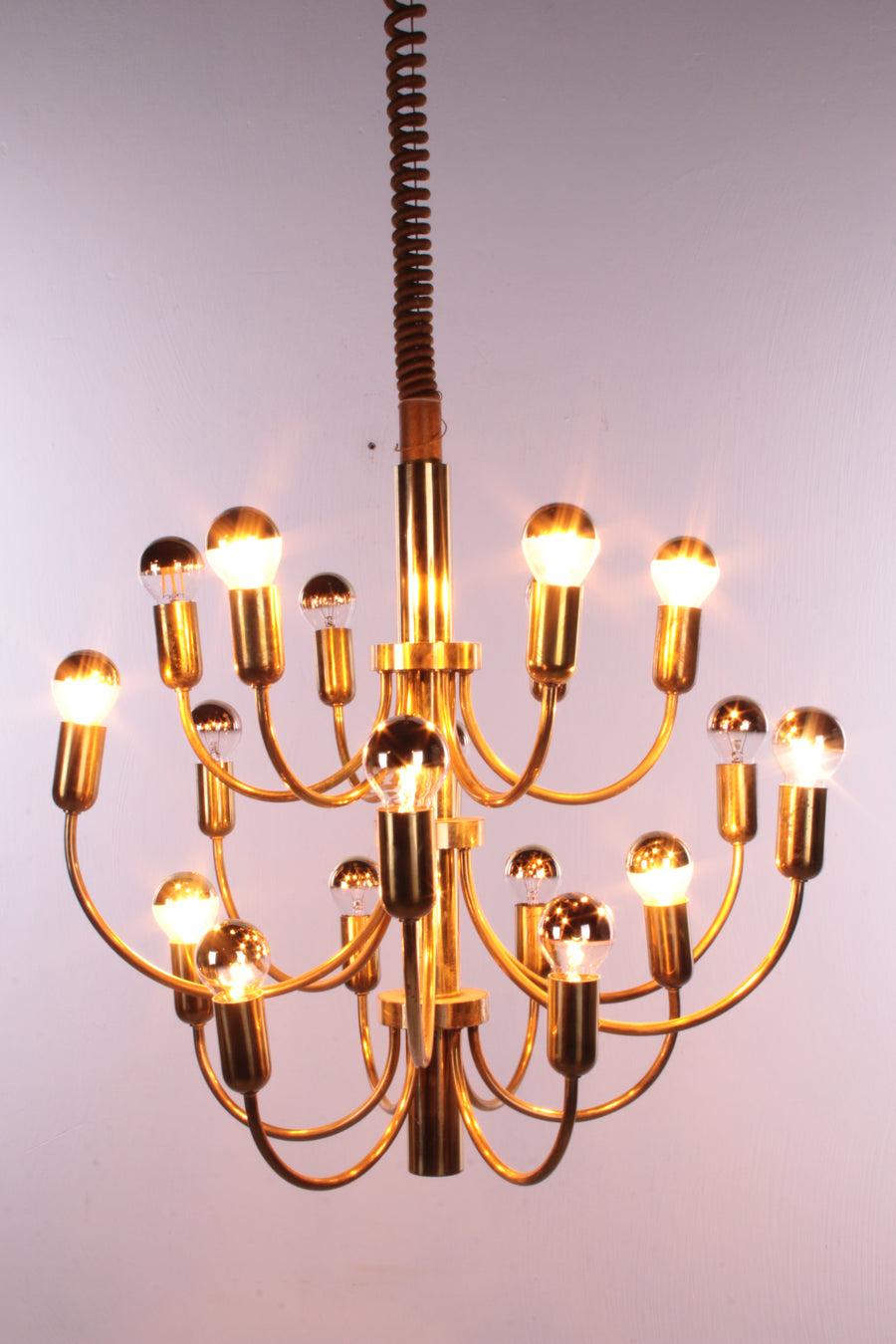 Vintage Italian Pendant Lamp Hollywood Regency, 1960

Very beautiful design lamp in the style of Gaetano Sciolari, Italy 1960.

Gaetano Sciolari vintage brass 18 light Pistillo candlestick ceiling lamp, 1970s, Italy.

This nature-inspired lamp is a