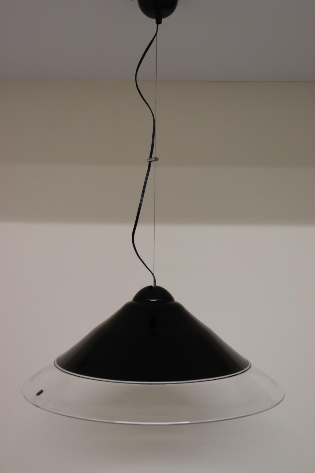 Vintage Italian pendant lamp in Murano black-crystal glass diffuser.
Manufactured by ITRE.
Dimensions: Diameter 21.50