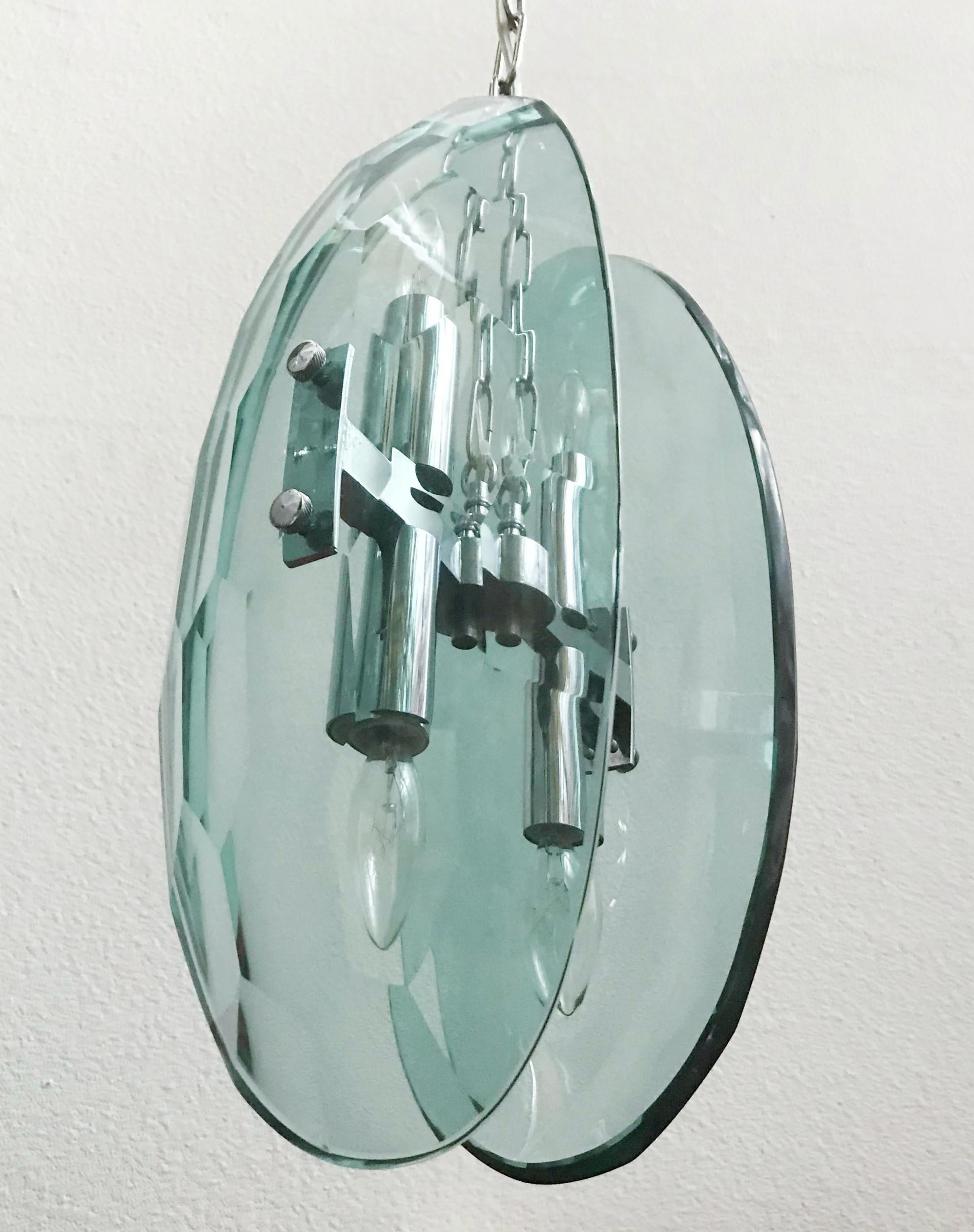 Vintage pendant with two large curved faceted beveled glasses, mounted on chrome frame by Max Ingrand for Fontana Arte/ Made in Italy, circa 1960s