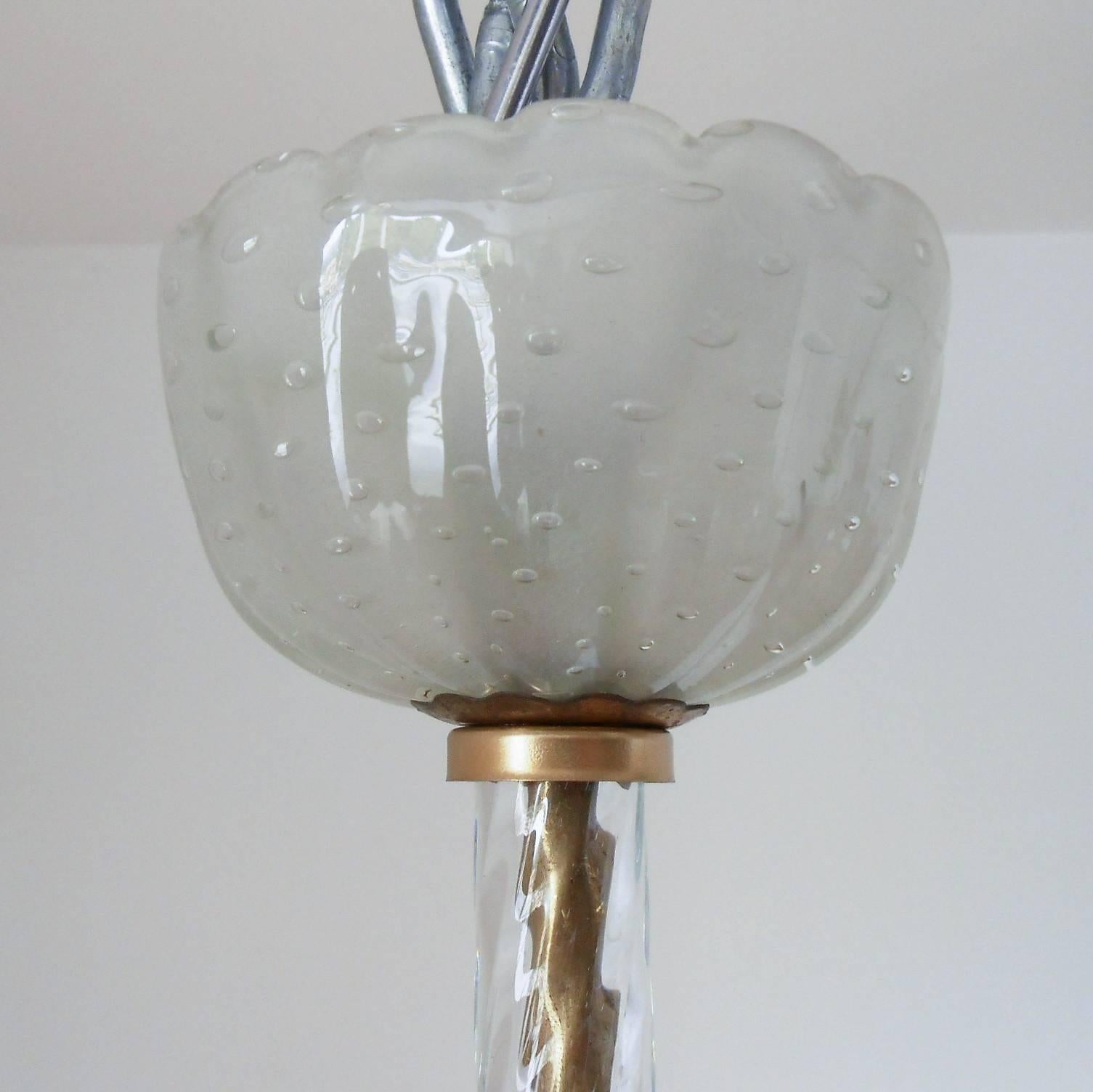 Vintage Italian pendant with clear Murano glass hand blown with bubbles within the glass using Pulegoso technique and brass details,designed by Ercole Barovier circa 1950’s, made in Italy.