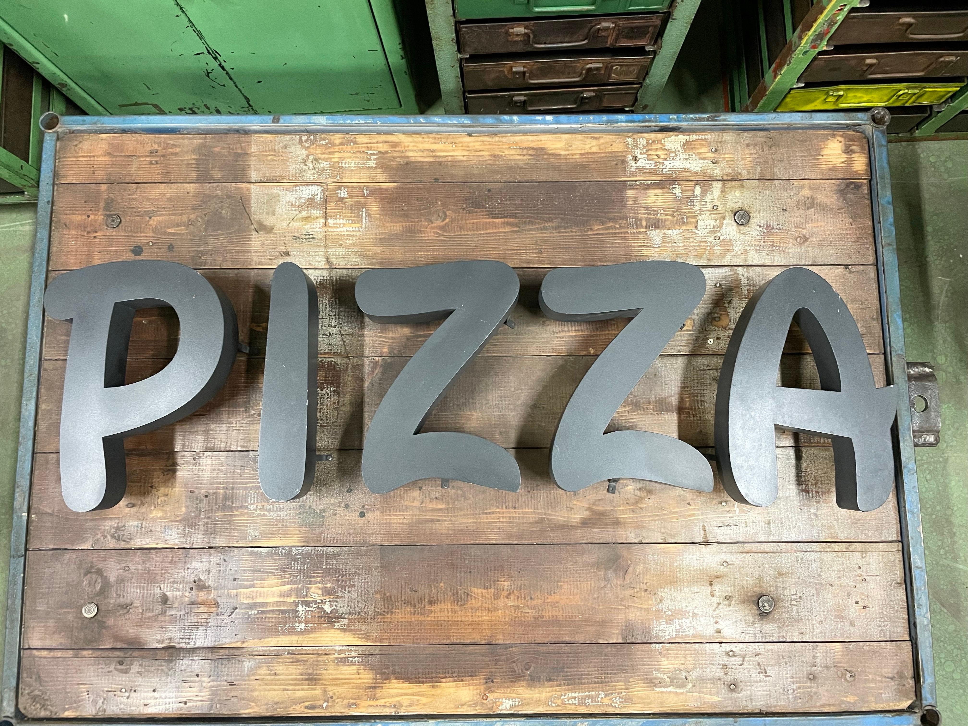 Vintage industrial grey iron sing “PIZZA”.  Set of five letters  was made during the 1970s in Italy. 
Dimensions : Total width : 110 cm,  Height  : 30 cm ,Depth : 5 cm, Depth with wall mounting : 10 cm
             