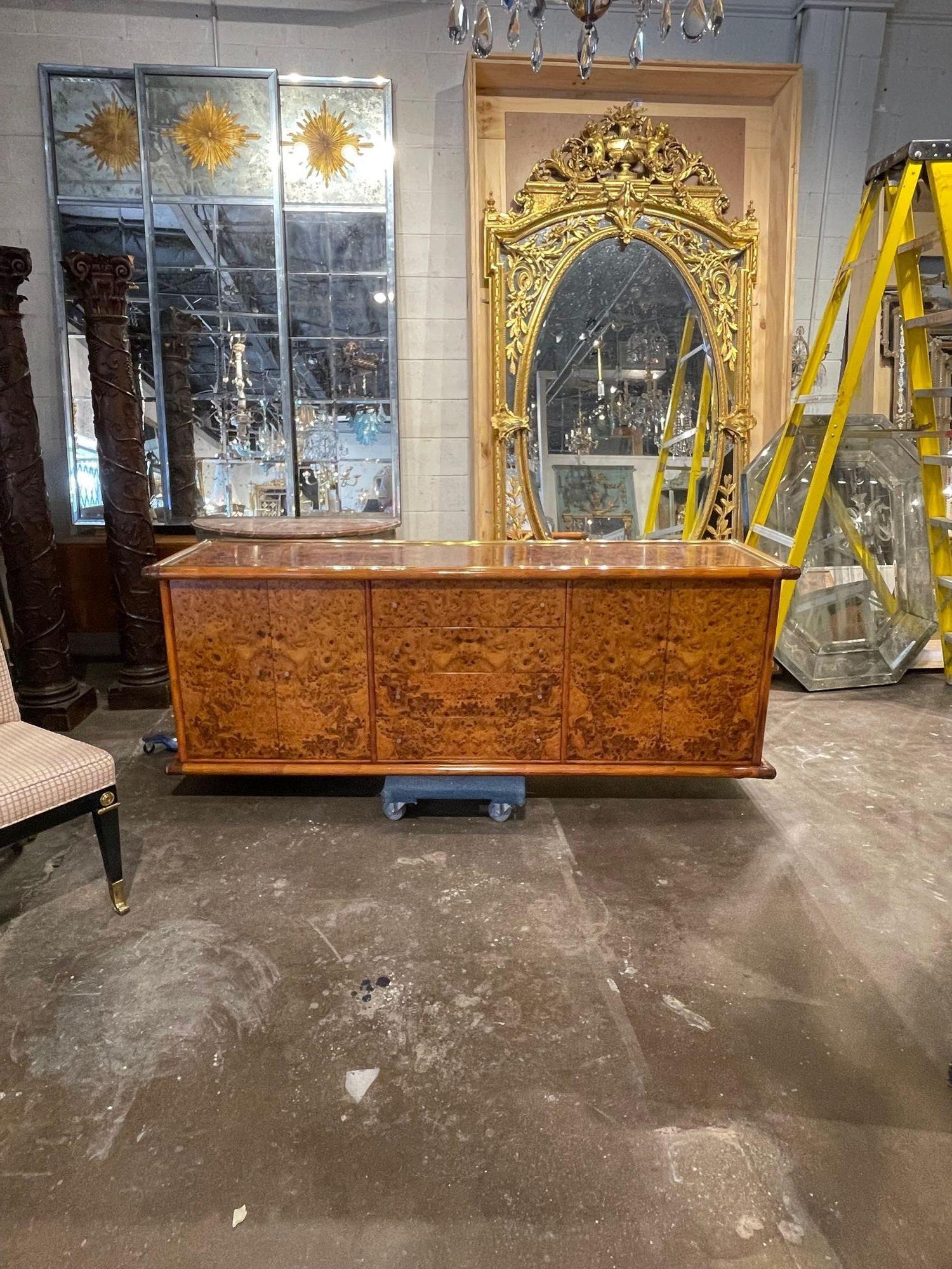 Handsome vintage Italian polished burl walnut and brass 2 sided credenza. Lovely wood grain, exceptional polish and beautiful clean lines. Fabulous!!