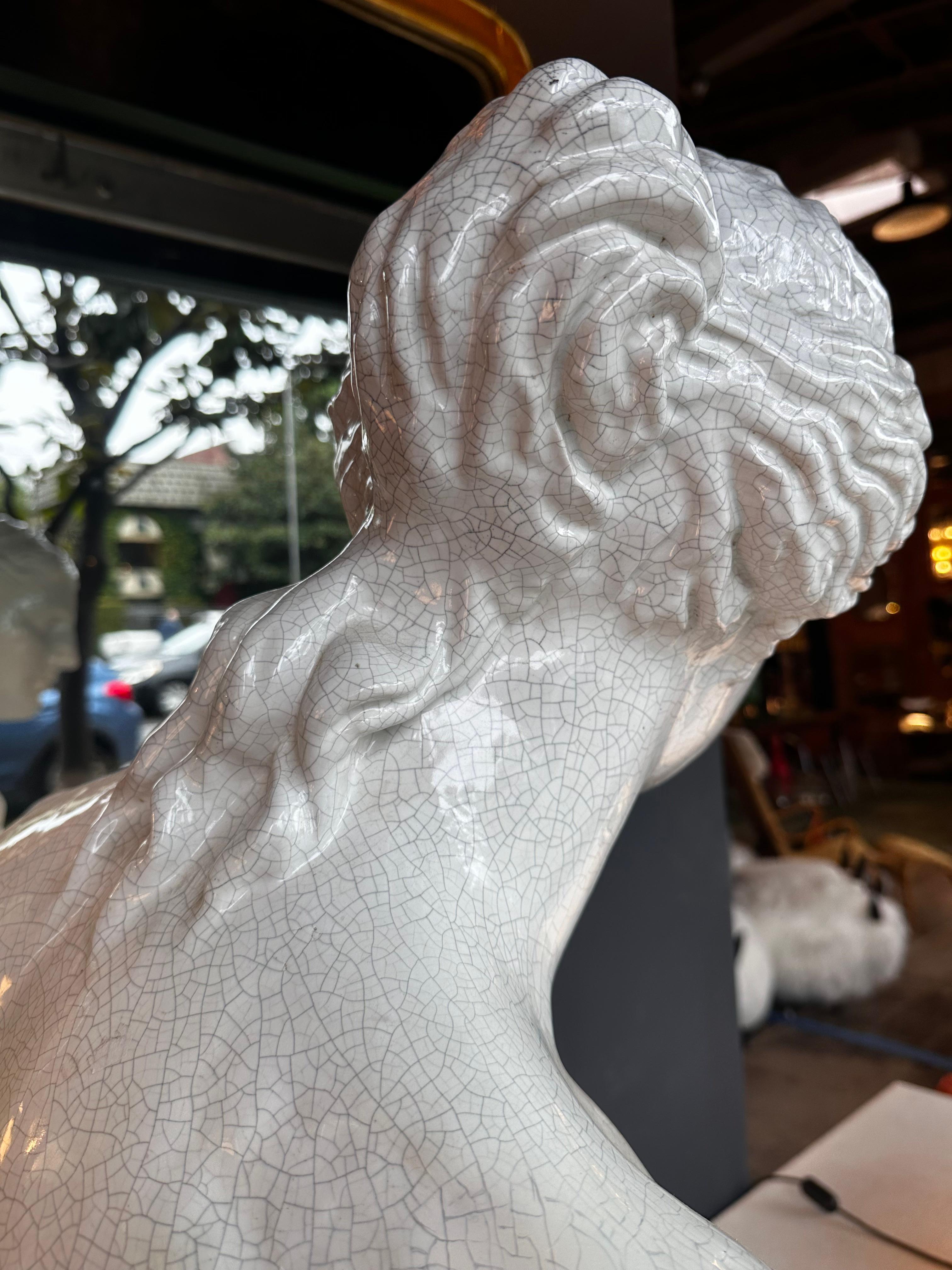 The Vintage Italian Porcelain Woman Sculpture from the 1970s is a graceful and timeless piece of art. Crafted in Italy, this sculpture features delicate porcelain work capturing the essence of a woman. The 1970s design elements add a touch of retro