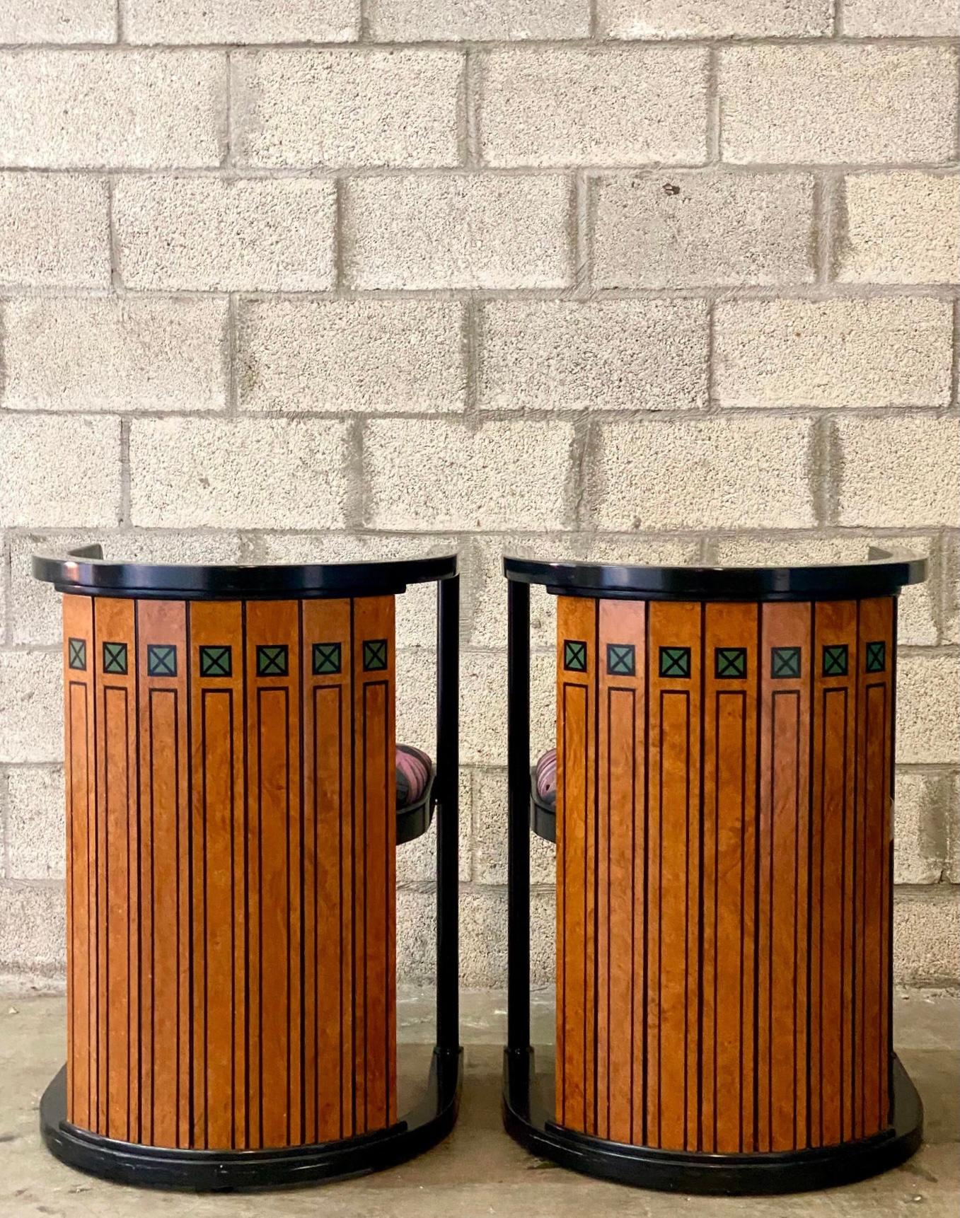 Fantastic pair of Italian Postmodern side chairs. Made by the iconic Elle Due Arredamenti ISA group. Beautiful and colorful jacquard upholstery with a chic ring of Burl wood on the back. Hand painted detail. Acquired from a Palm Beach estate.