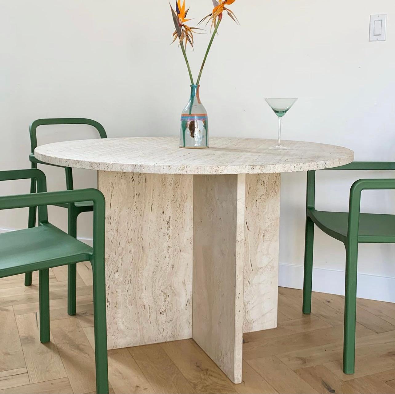 A vintage solid raw Italian travertine bistro dining table, circa 1970s. Base is 2 separate v-shaped modular legs, top is round. Edges are raw. Condition is excellent. Pick up in LA, or inquire for alternative shipping quotes!
45” diameter, 29.5”