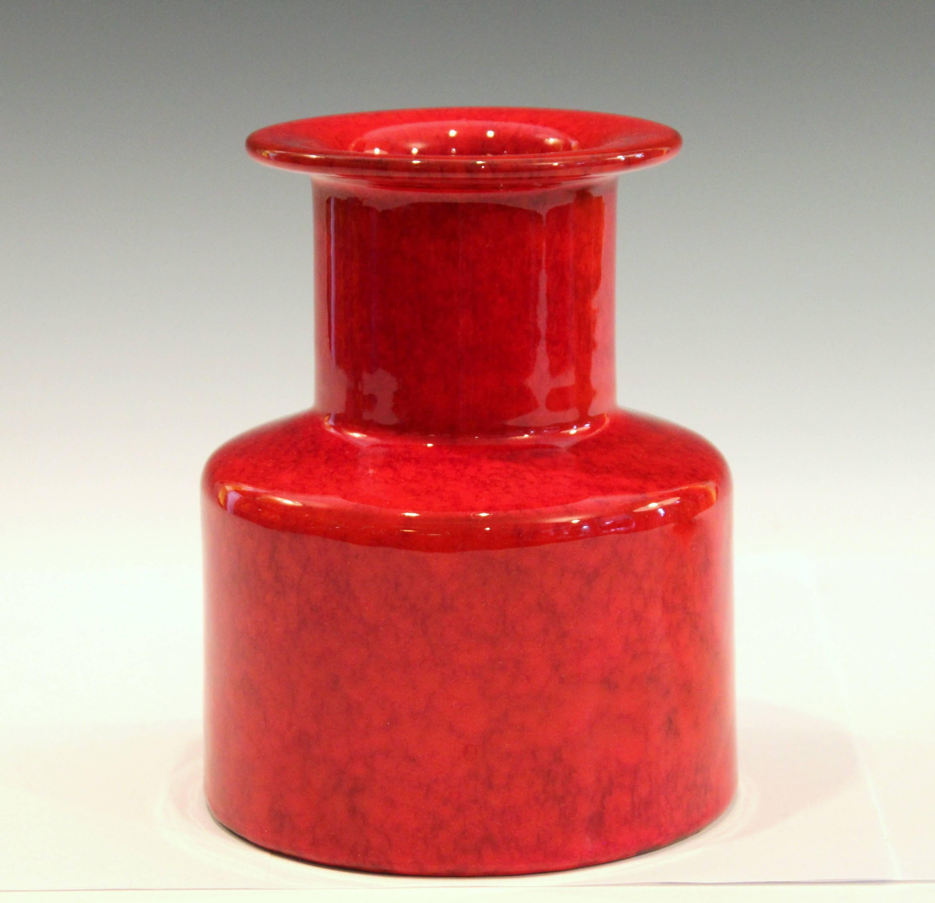 Vintage Italian pottery Rouleau form vase in mottled atomic red glaze, circa 1960s. Attributed to Italica Ars. Measures: 6