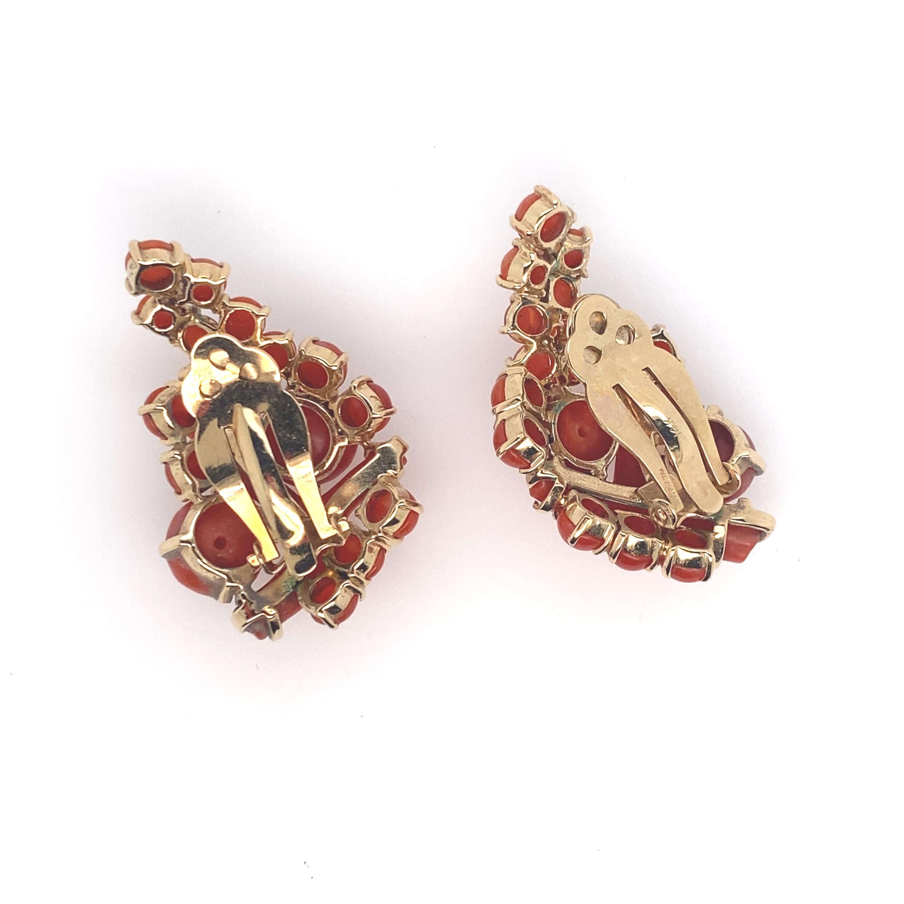 One-of-a-kind Vintage Red Coral earrings from Italy.  Circa 1950's.  Featuring two beautiful, free form coral branch earrings, also set with  round red coral cabachons.  Truly statement pieces.  See the other pieces in the set in my listings.  These