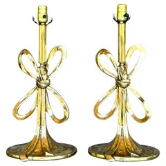 Vintage Italian Regency Polished Brass Bow Lamps - a Pair