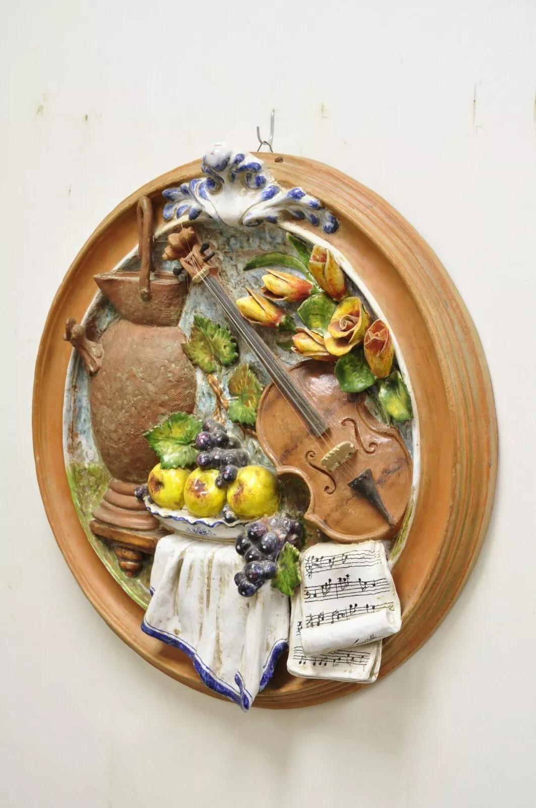 Vintage Italian Regency Style Glazed Terracotta Fruit & Violin Wall Art Plaque. Circa Late 20th Century. Measurements: 28