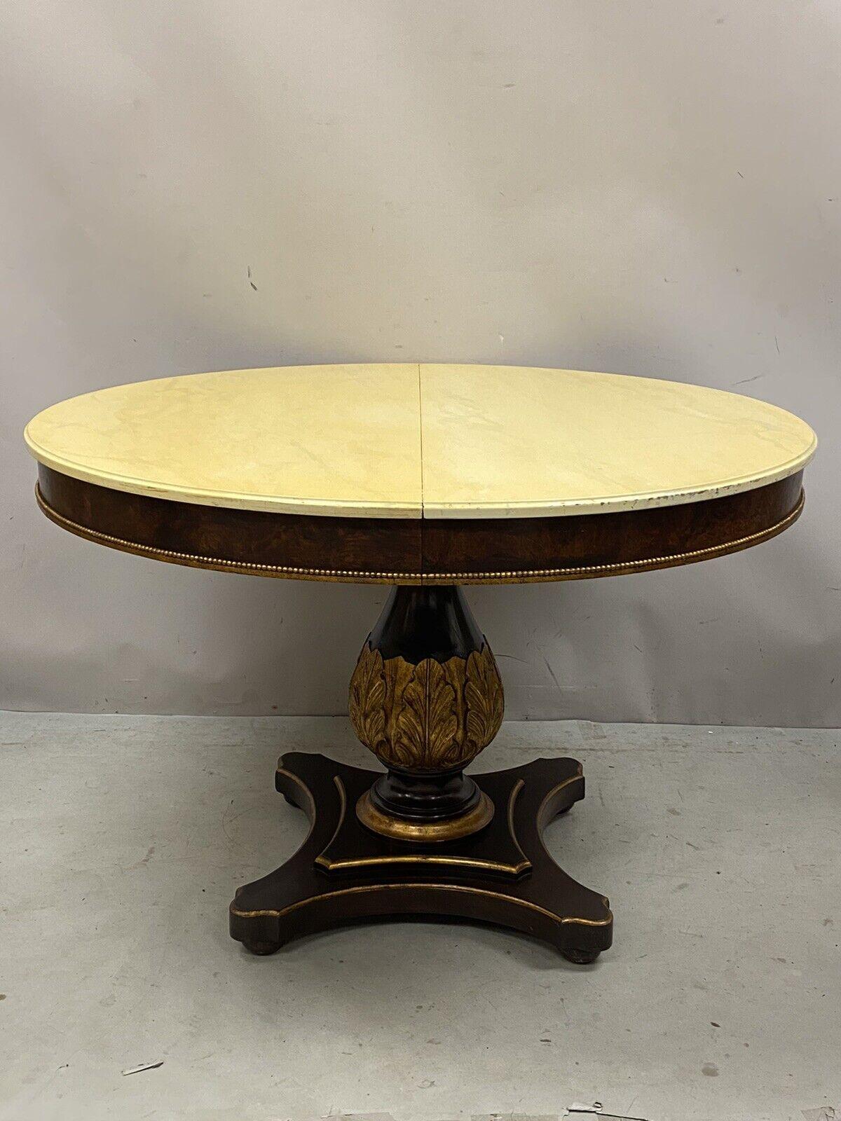 Vintage Italian Regency style pedestal base round dining table with cream Lacquer top. Item features (2) 18