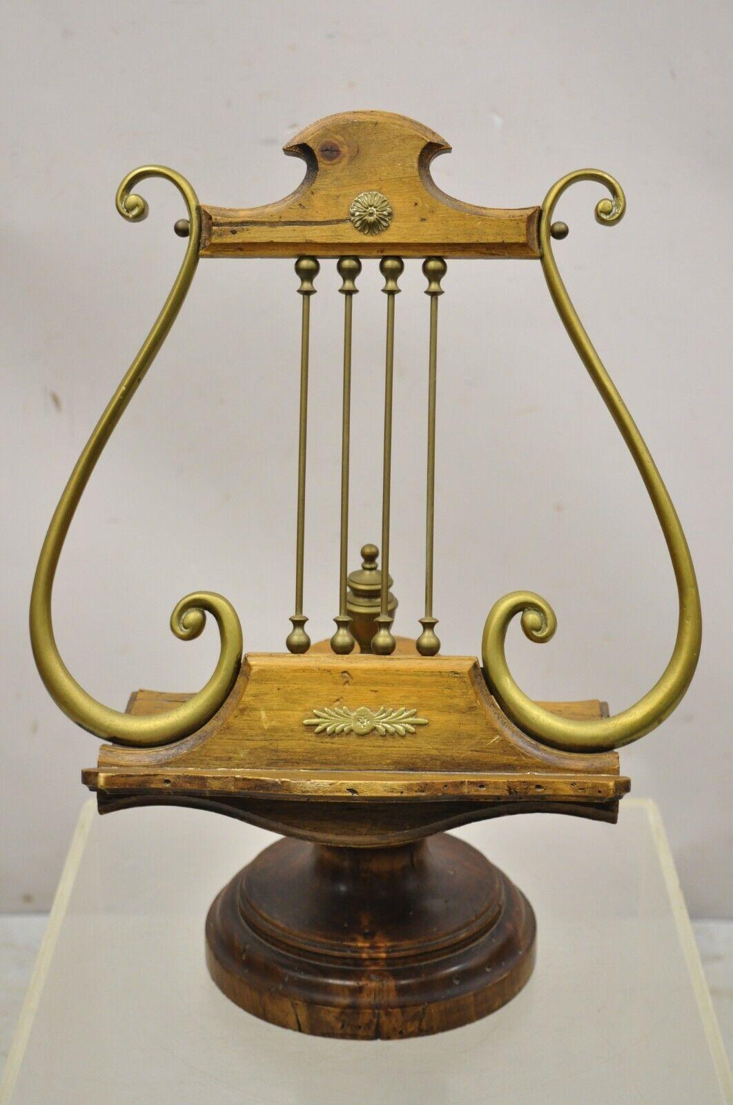 Vintage Italian Regency Wood and Brass Lyre Harp Music Stand. Item features solid brass accents, distressed finish, quality Italian craftsmanship, stamped 