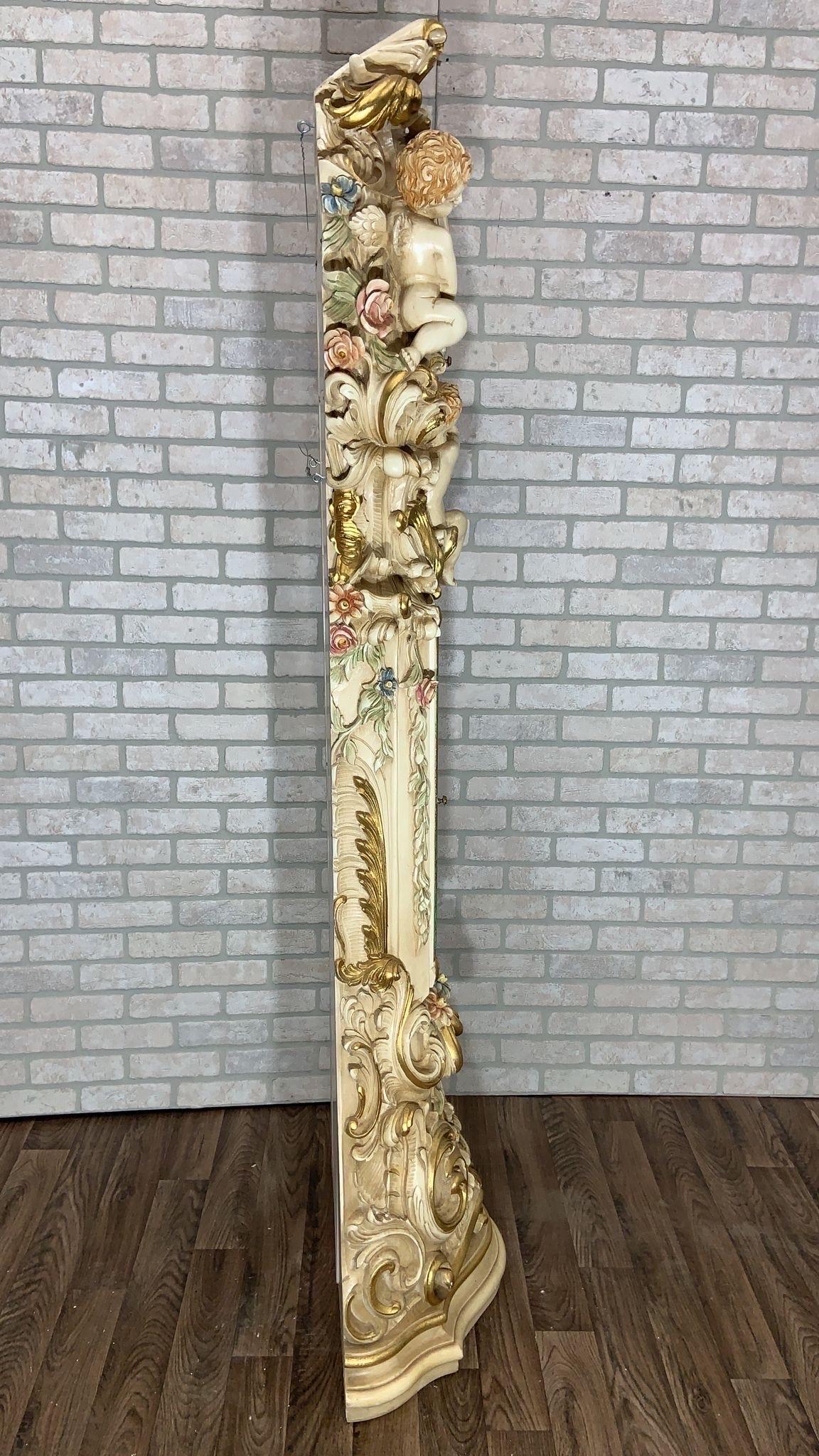 Vintage Italian Rococo Hand Carved and Painted Cherub/Angel Grandfathers Clock 

Featuring an Italian Rococo style hand carved and painted grandfather Clock. The clock has 3 cherubs at the top holding the clock's face. This floor clock is a piece of