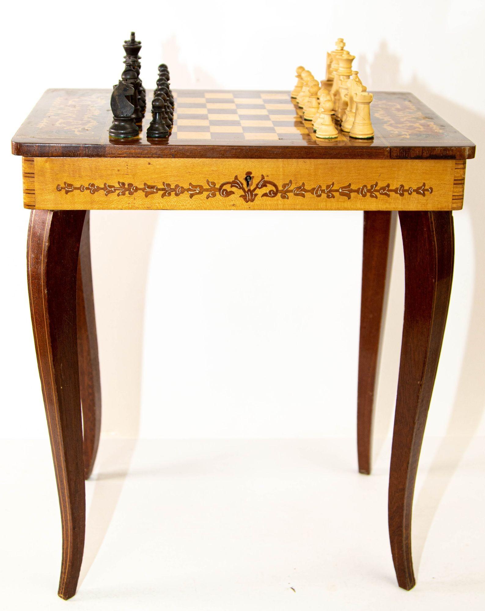 Vintage Italian Rococo Style Satinwood Inlaid Marquetry Music Box Side table, Chess Game Table.
A small, Italian Rococo style rectangular wood side or end table with a beautifully decorative satinwood inlaid marquetry chess top, cabriolet legs and