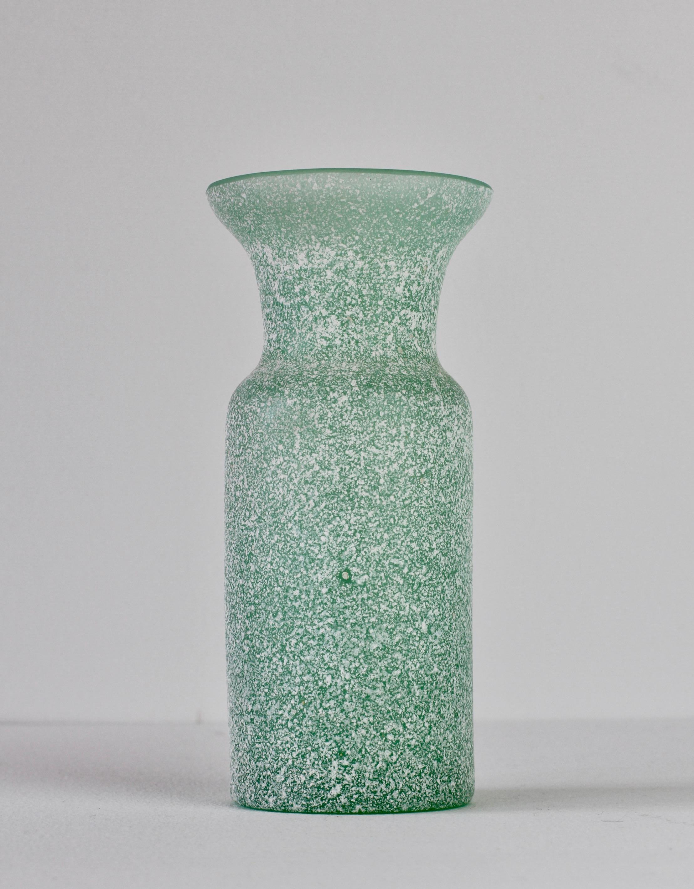 Beautiful 'a Scavo' green colored / coloured glass vase or vessel by Seguso Vetri d'Arte Murano, Italy. Elegant in form and showing wonderful craftsmanship with the use of the 'Scavo' technique to replicate to look and feel of ancient Roman