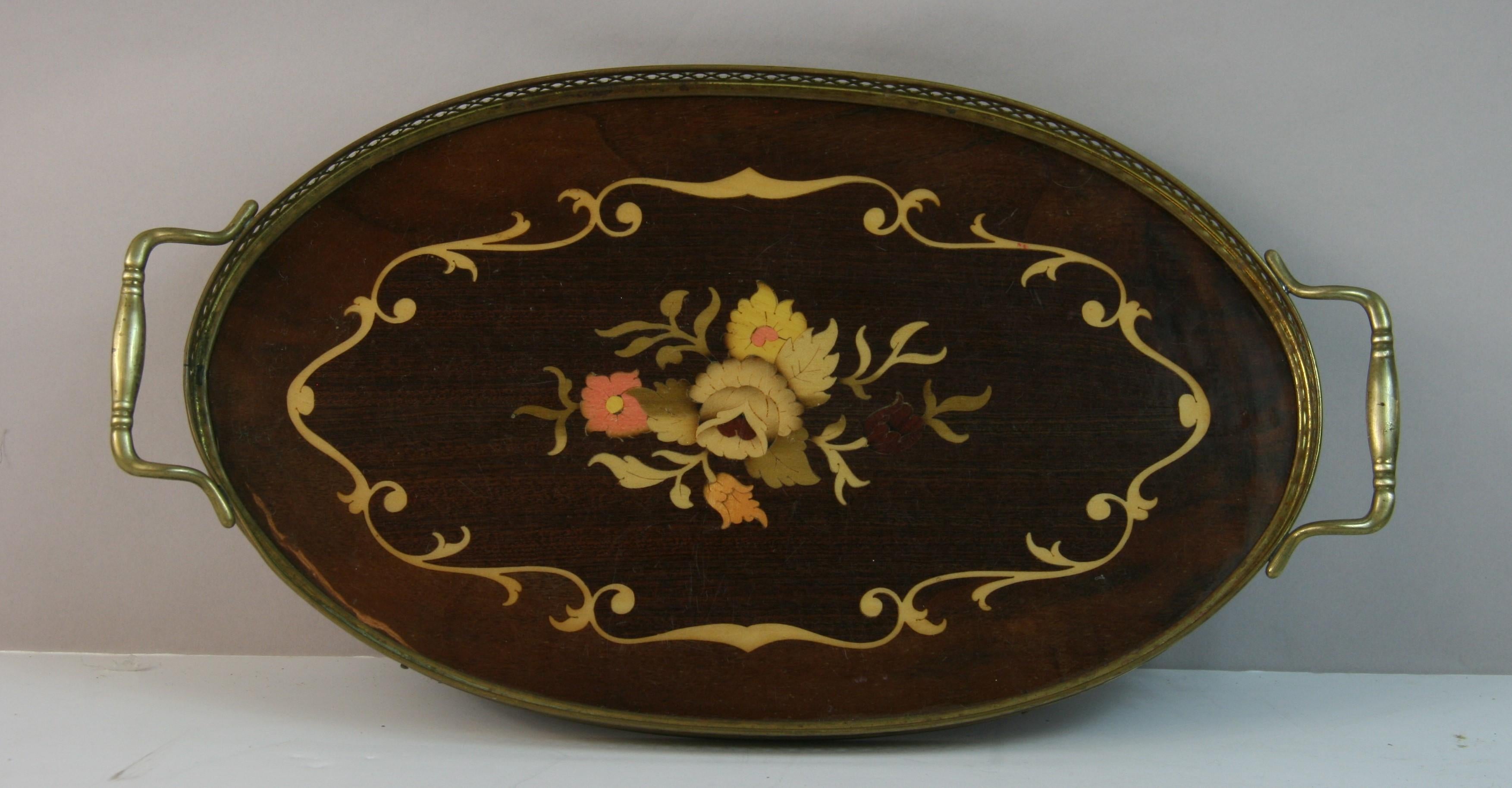 1722 Italian inlaid wood serving tray with protective coating with brass filigree rim and handles.