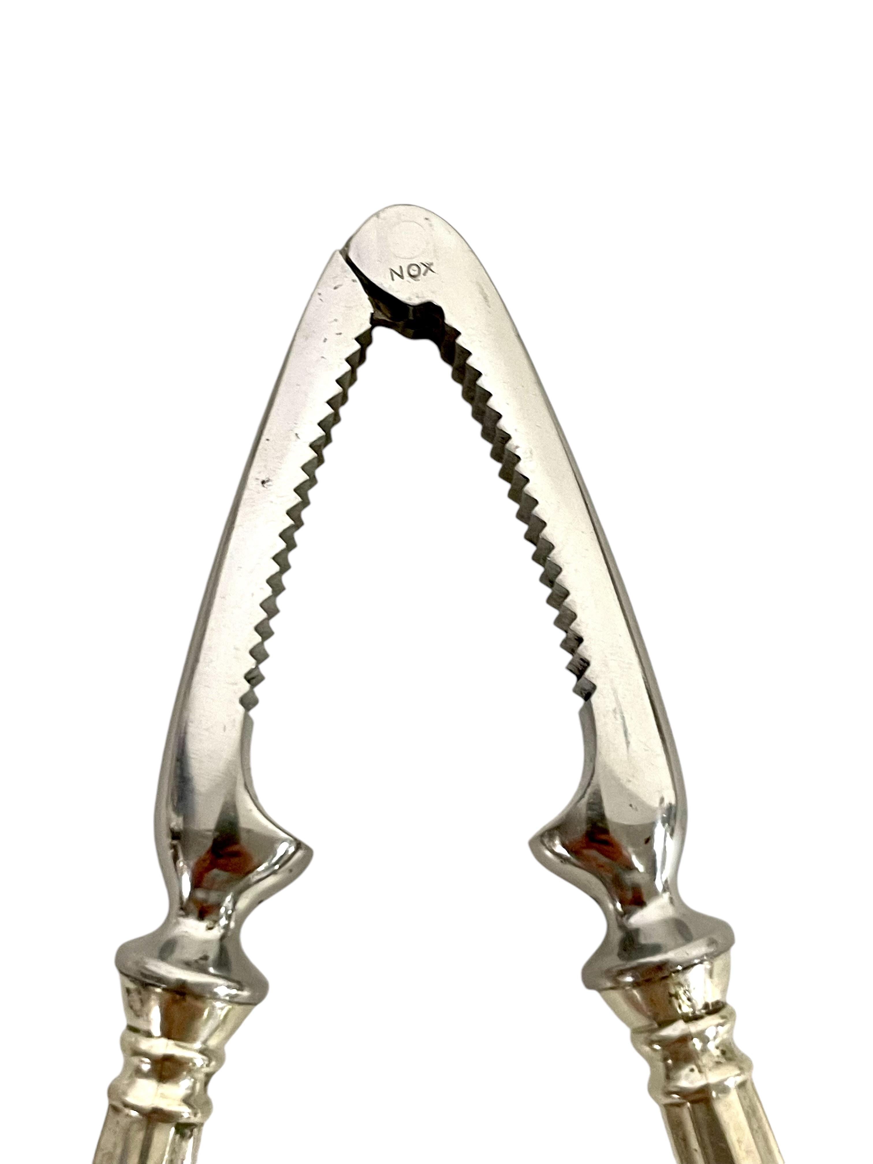 Duo di apribottiglie e schiaccianoci d'argento d'epoca italiana in vendita 2
