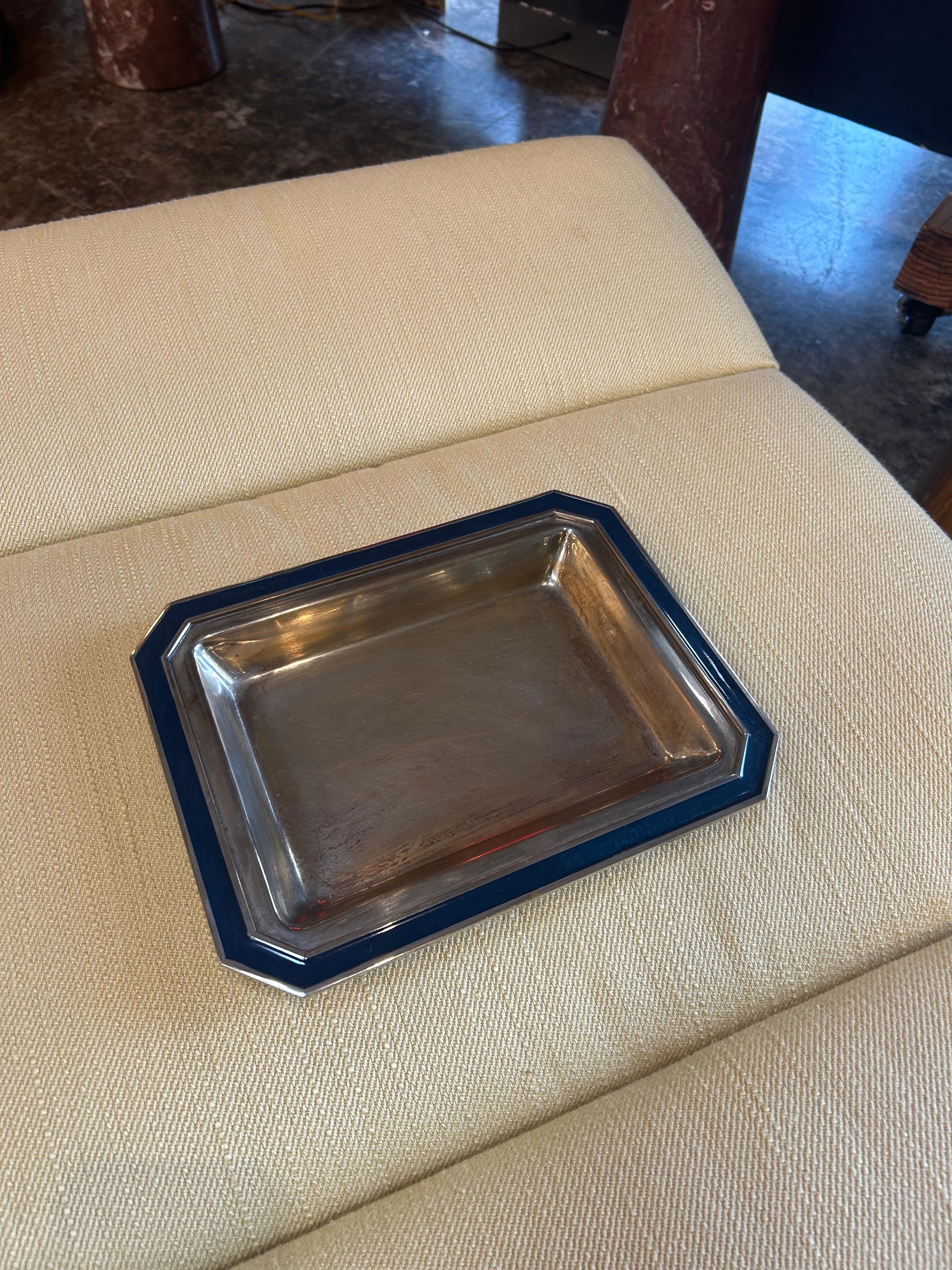 This vintage Italian tray features silver plating with a deep blue enamel border and a classic rectangular design with beveled edges. 