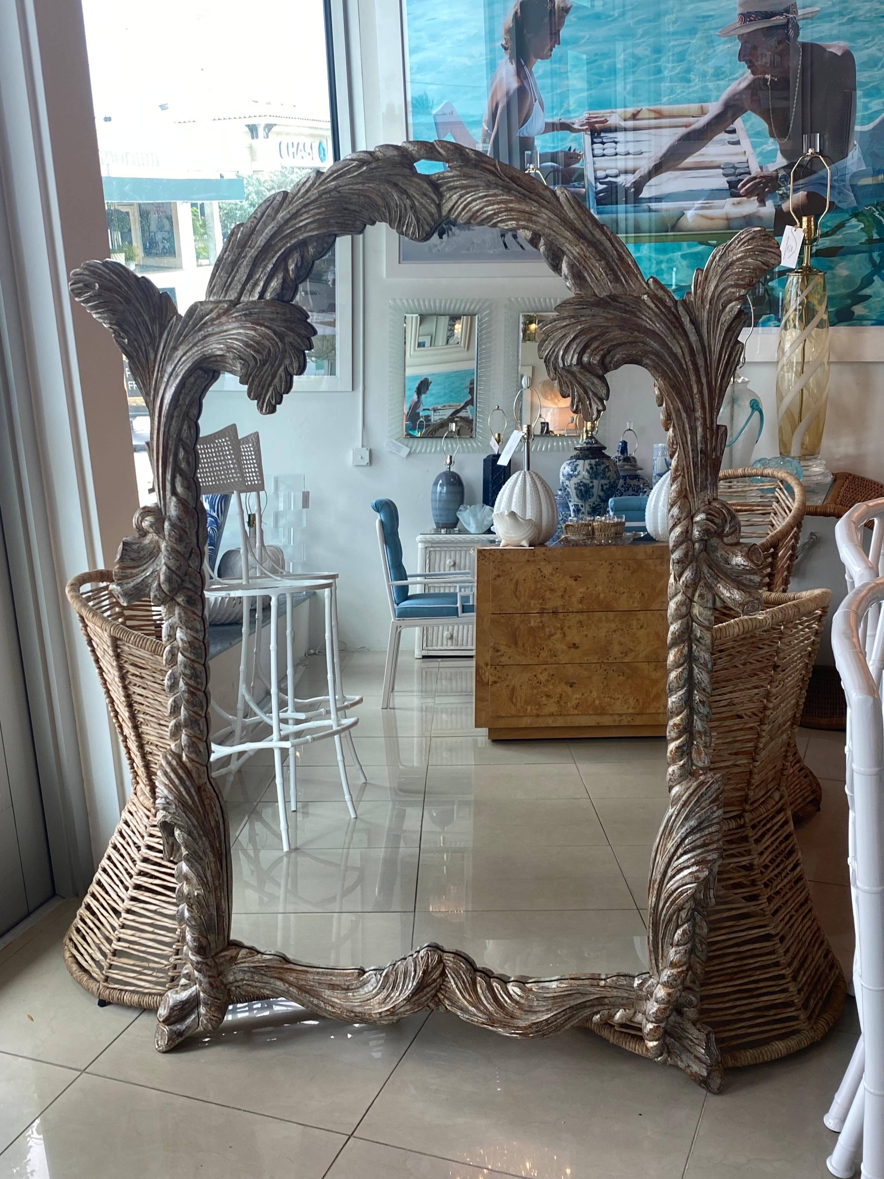 The most beautiful vintage LaBarge wall mirror! All hand carved wood with a lovely original silver gilt finish Made in Italy. This can be lacquered for an additional cost. The details are amazing, palm frond leaves and rope. Comes ready to hang.