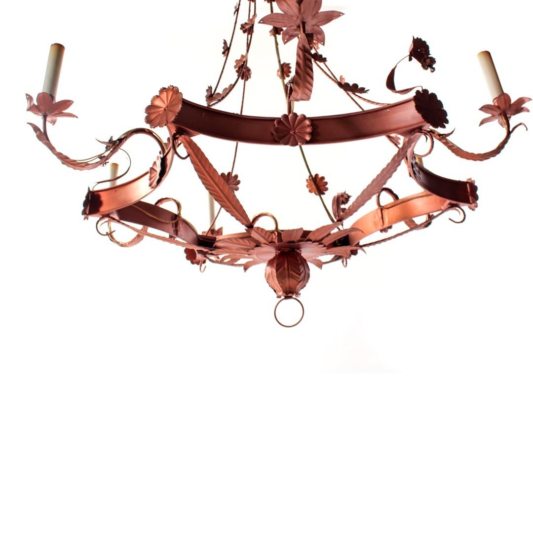 A fanciful vintage copper-finished tole chandelier with six arms and original shades. Italian, circa 1940.

Measures: 37 inches wide × 43.5 inches total drop H.