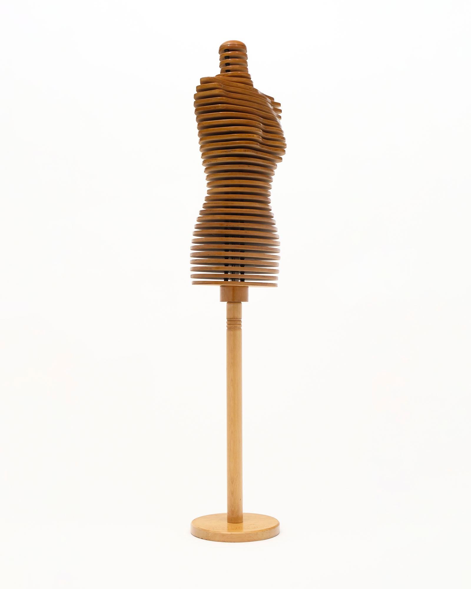 Vintage Italian slatted wooden Mannequin made of cherrywood from from a fashion Milan atelier. Its made of cherrywood slats that stack together to form this sculptural form.