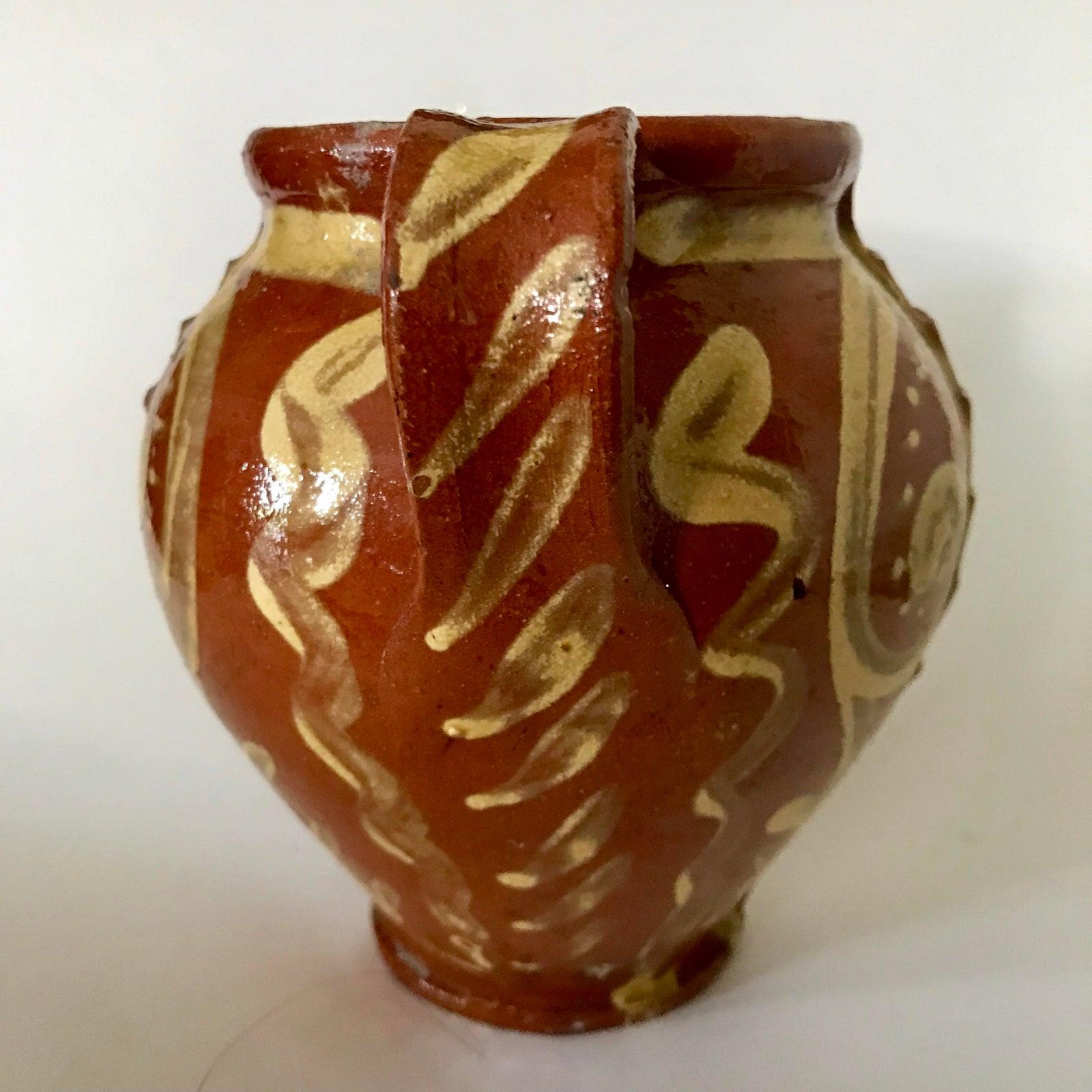 Vintage Italian slipware terra cotta vase with handles. Stamped on bottom ‘Made in Italy’.