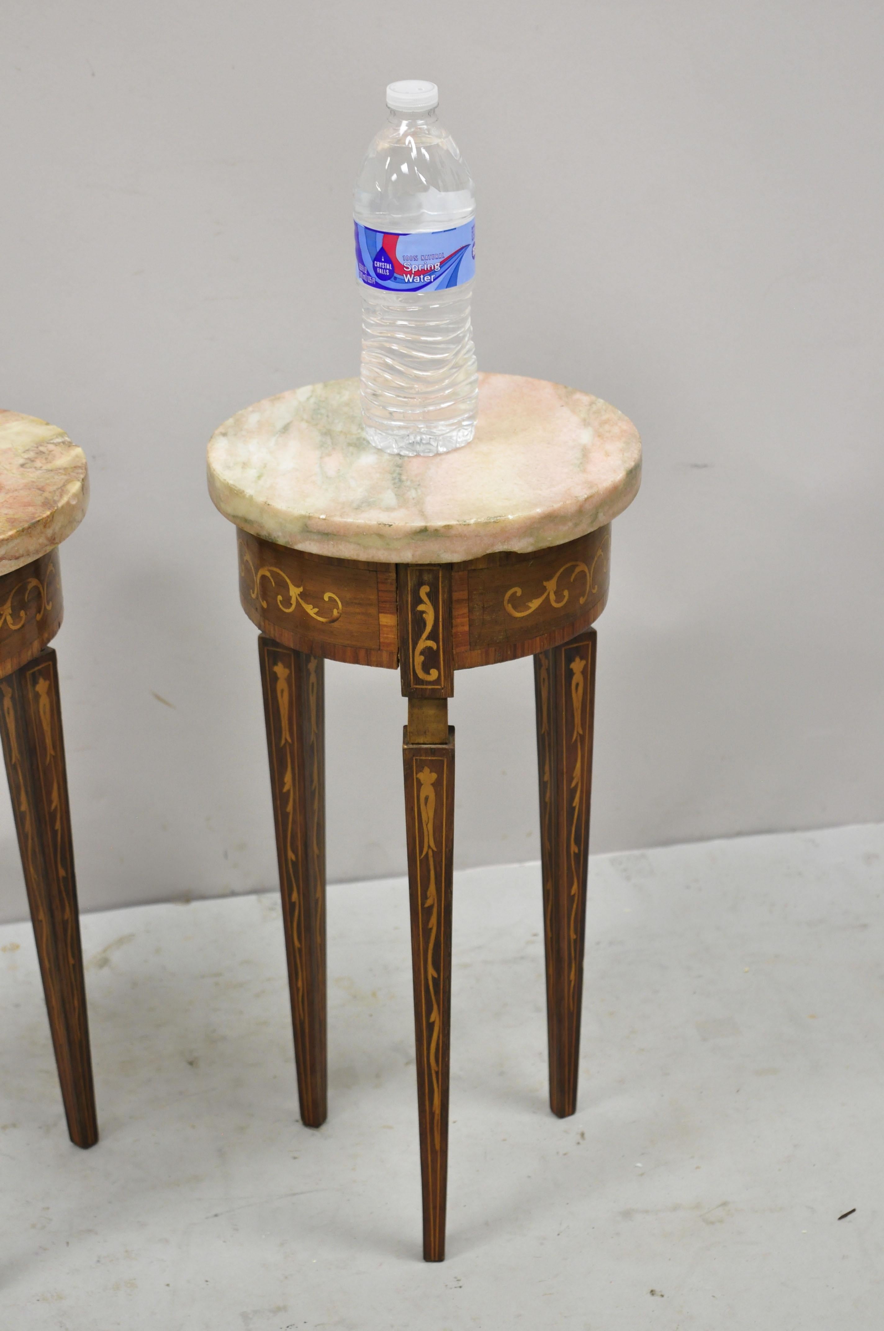 Vintage Italian small petite pink marble top round satinwood inlaid side table - a Pair. Item features pink marble tops, satinwood inlay throughout, small petite size, very nice vintage pair, quality Italian craftsmanship, great style and form.