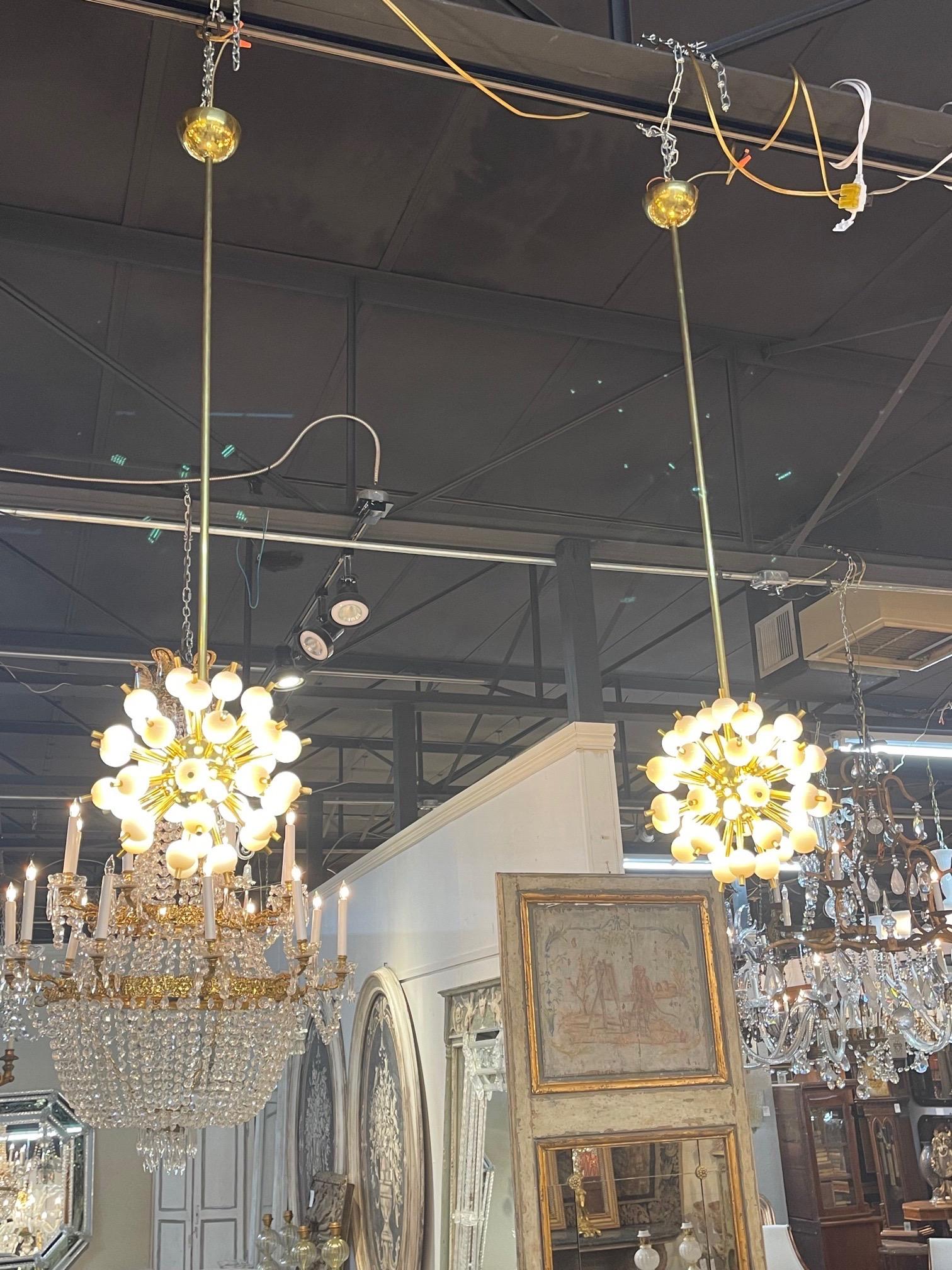 Stylish pair of vintage Italian small scale brass and glass sputnik pendant lights. Very fine quality and great for a modern look. Better hurry...these will go fast! Note price listed is for 1.