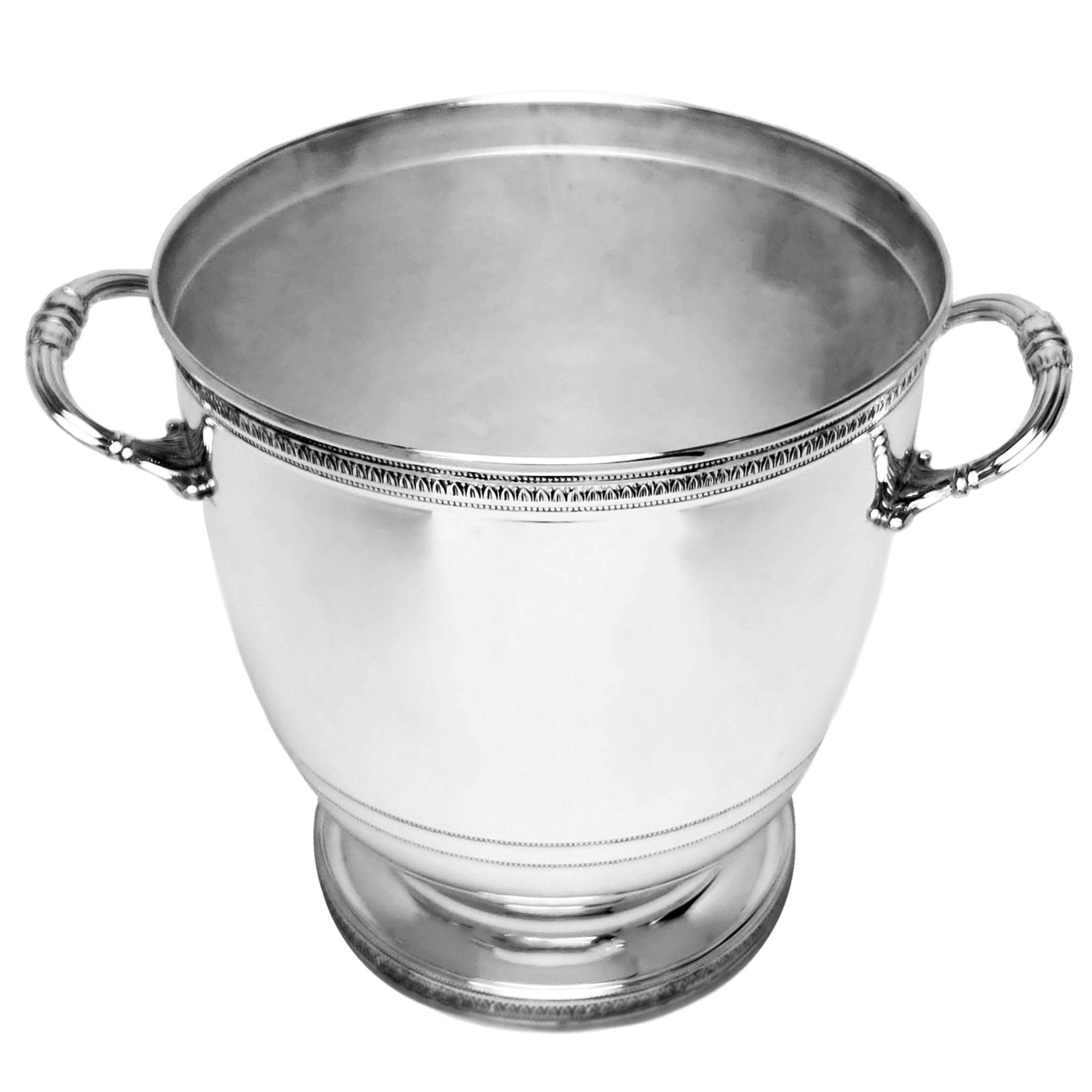 An impressive vintage solid Silver Italian Champagne / Wine Cooler with a highly polished exterior. The Ice Bucket is embellished with delicately patterned applied bands on the upper rim & the foot. The Cooler has two patterned handles.

Made in