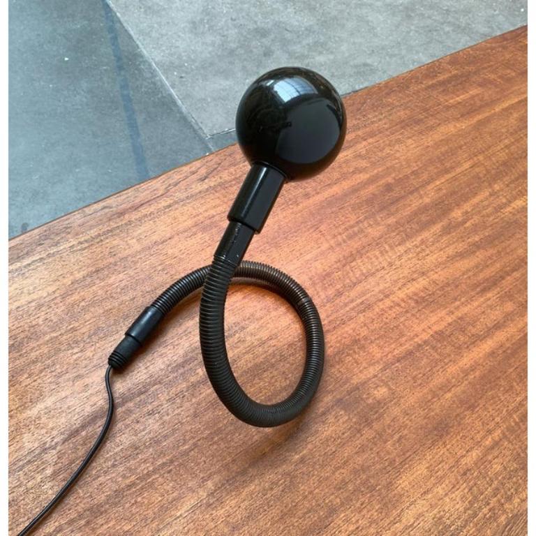 Hebi lamp from the Italian manufacturer Valenti based on a design by Japanese designer Isao Hosoe from the 70s.

A design classic of the 70s. The Hebi is adjustable to almost any position via the characteristic hose arm. The spherical shade can be