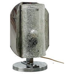 Sculptural table lamp in steel and glass, collectible Mid-Century design