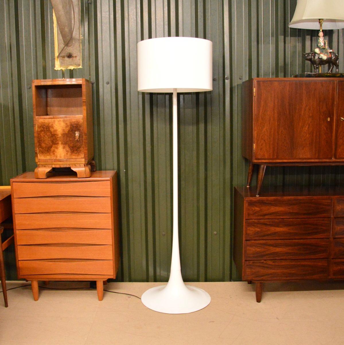 A stylish and incredibly well made vintage Italian Spun floor lamp by Flos, dating from the early twenty first century.

This was designed by Sebastian Wrong, it is of superb quality. It is a great size and is a most impressive item. Current retail