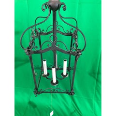 Lanterna quadrata italiana vintage a quattro luci in ferro battuto con finitura rustica