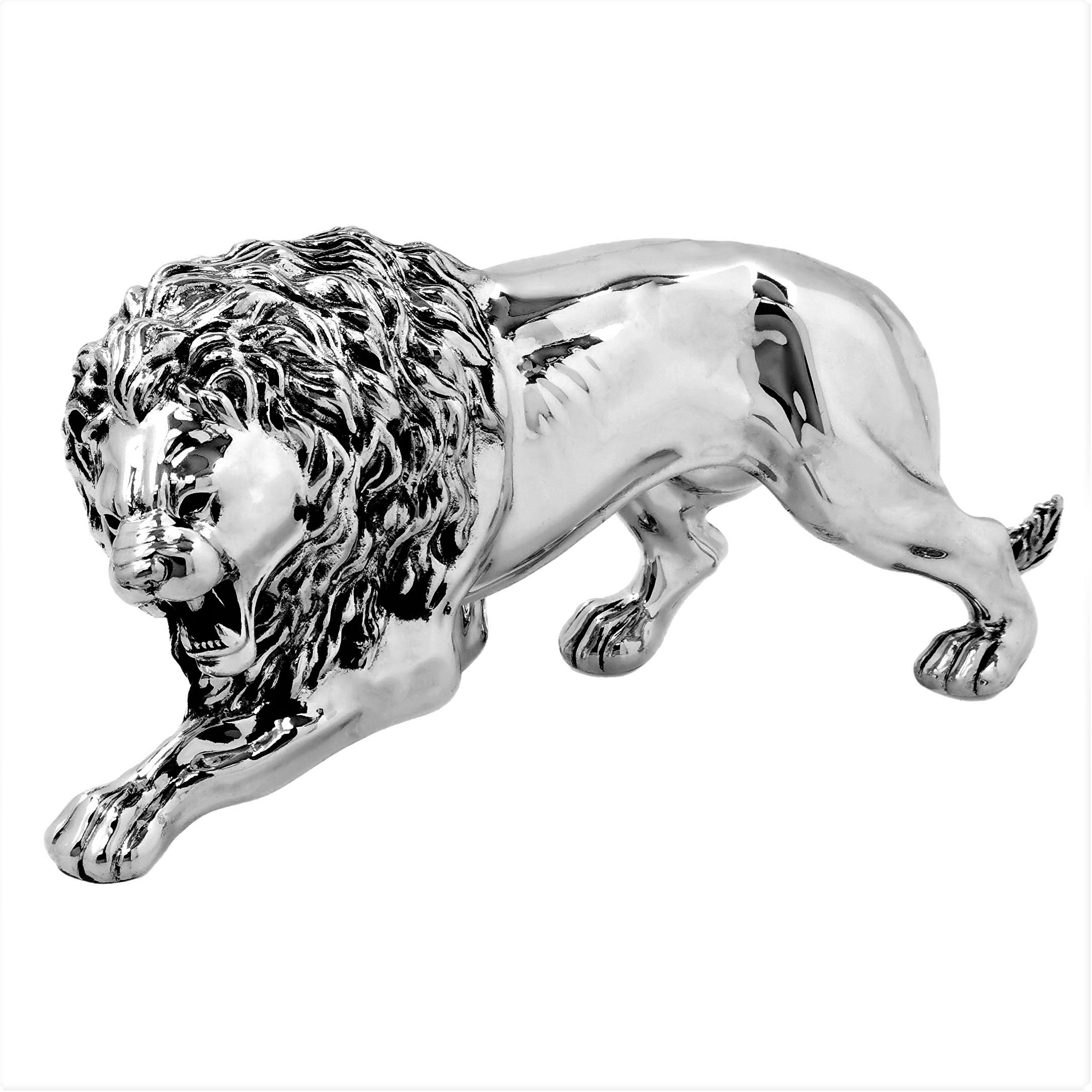 An elegant sterling Silver model of a male Lion with an impressive mane and appearing to prowl. The Body of the Lion has a highly polished finish and the figurine is of a notably impressive weight.

Made in Italy in c. 1960.

Approx. Weight - 1316g