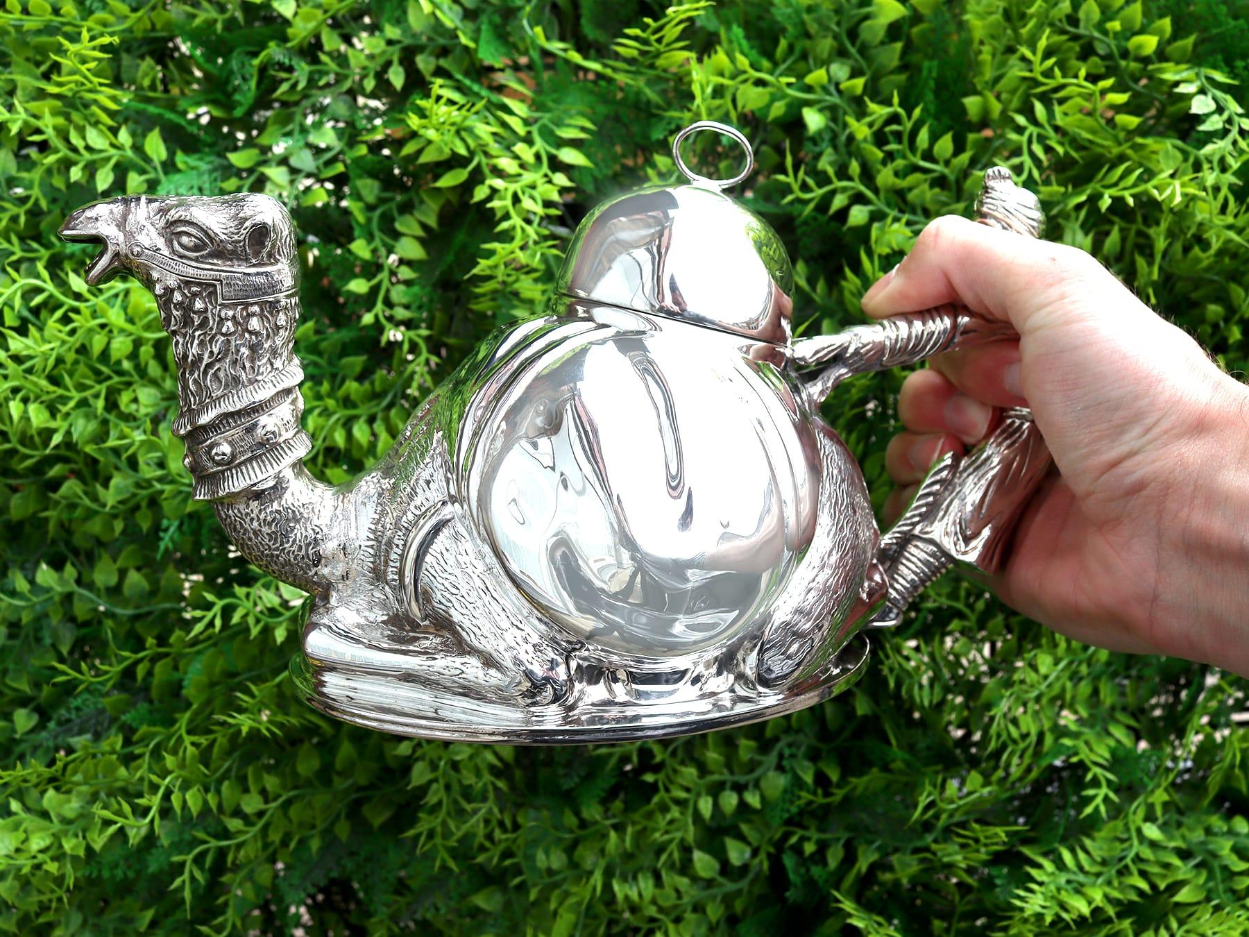 A magnificent, exceptional, fine and impressive vintage Italian sterling silver teapot modelled in the form of a camel; an addition to our silver teaware collection.

This magnificent vintage cast Italian sterling silver teapot has been