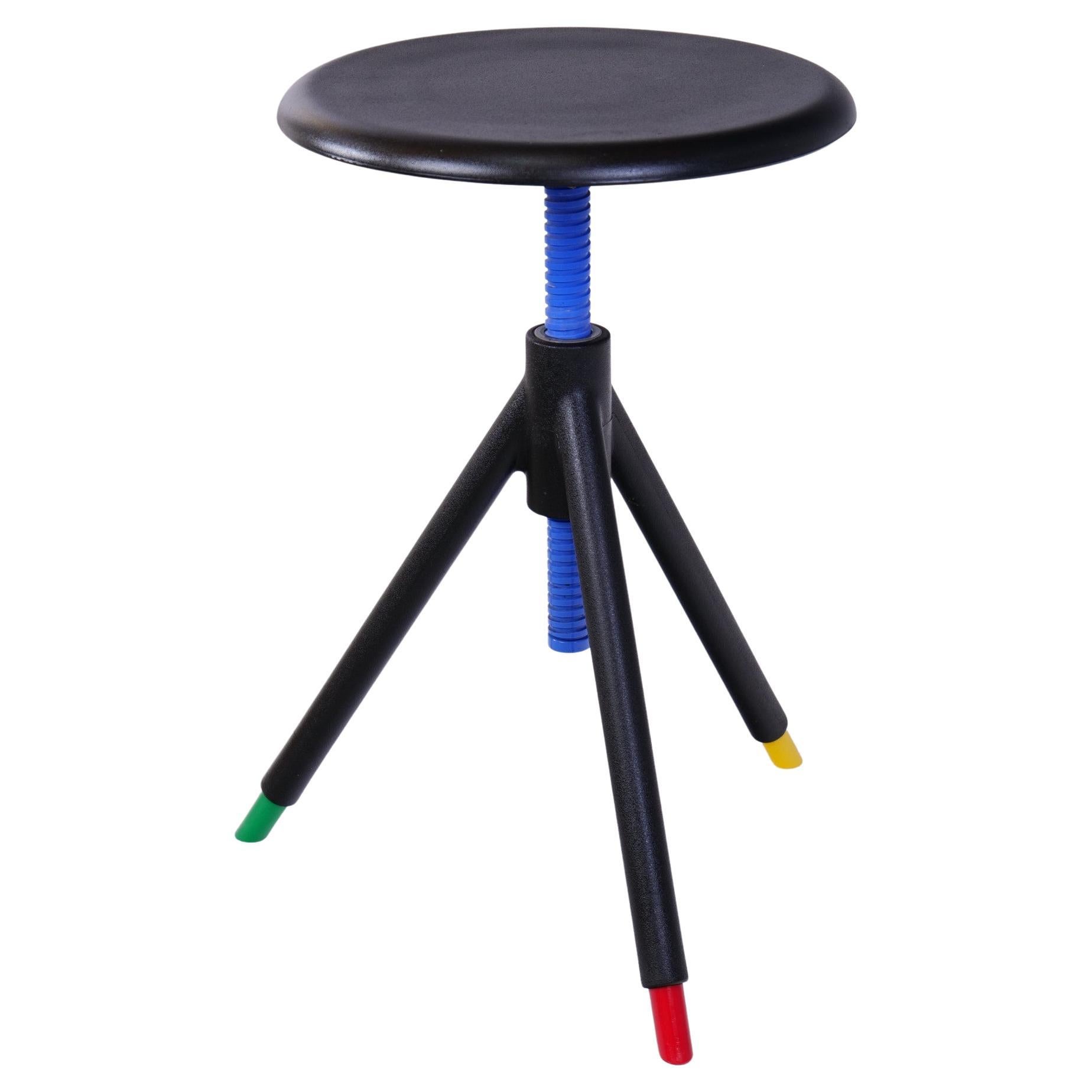 Black red, green and yellow swivel stool by Raul Barbiere for Rexite.

Made in Italy - 1980 's

Dimensions:
36 cm diametre seating 
70 cm heigh
46 cm low
Material:
Rubber and plastic
Good condition with slight signs of age.