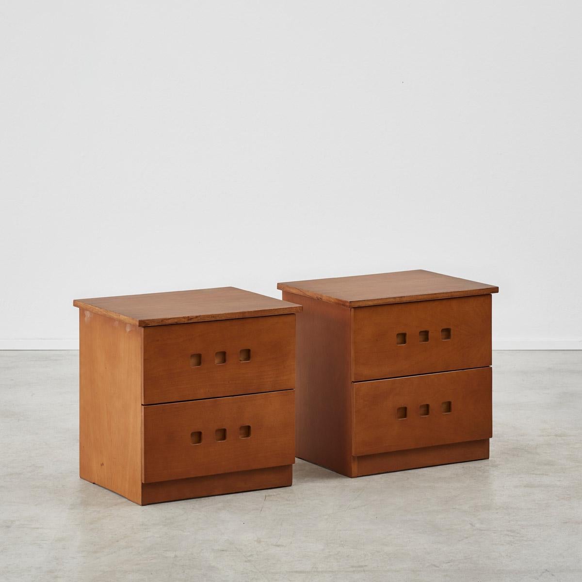 A pair of Italian wooden bedside tables, with two well sized drawers and square recessed handles. Their function doesn’t negate their beauty, with geometric shapes echoed throughout. 

The side tables have been recently restored; some texture/wear