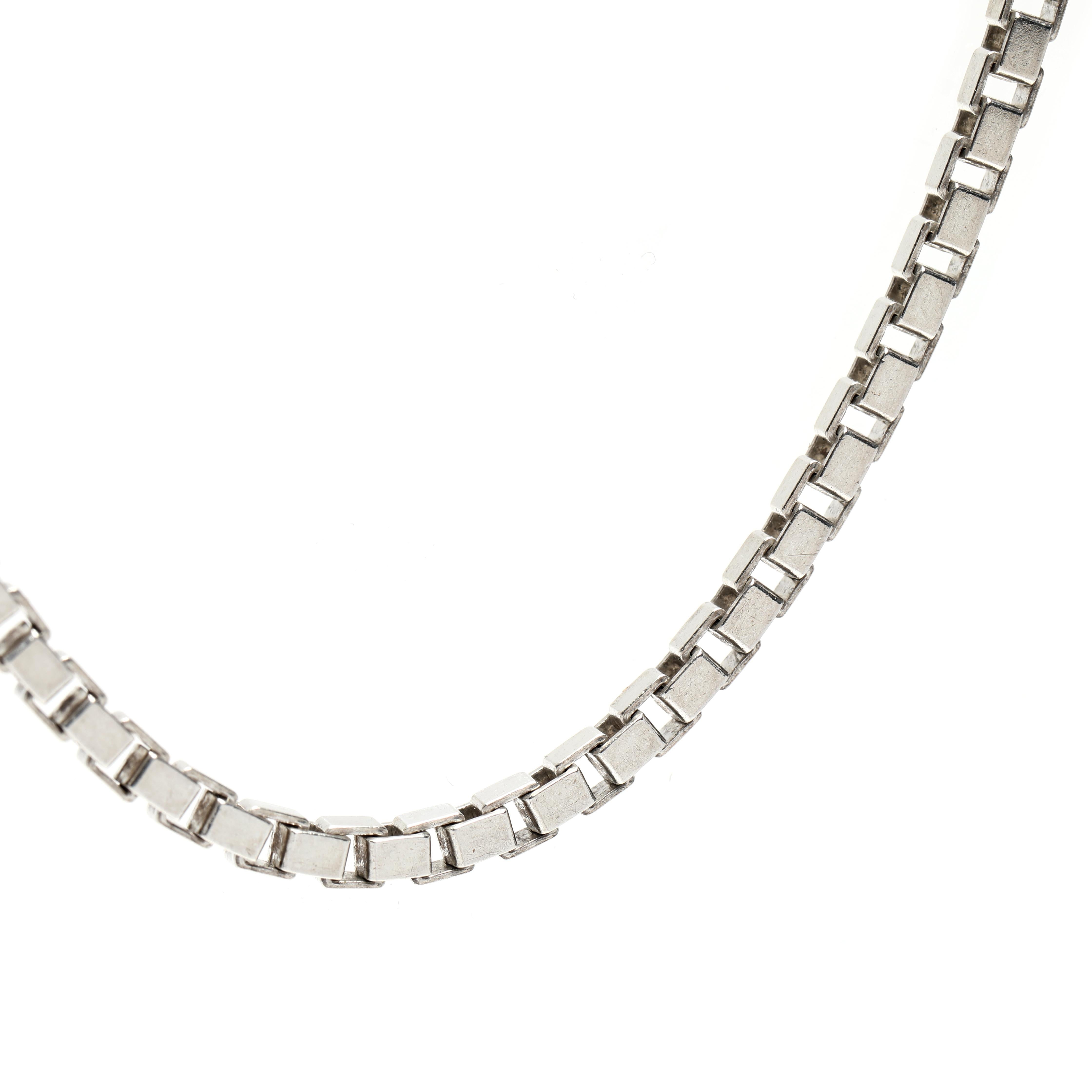 This gorgeous vintage Italian box chain necklace is crafted in sterling silver. It features a thick box chain design with a 16-inch length and a bold statement. This stunning necklace is sure to impress and will make a great addition to any jewelry