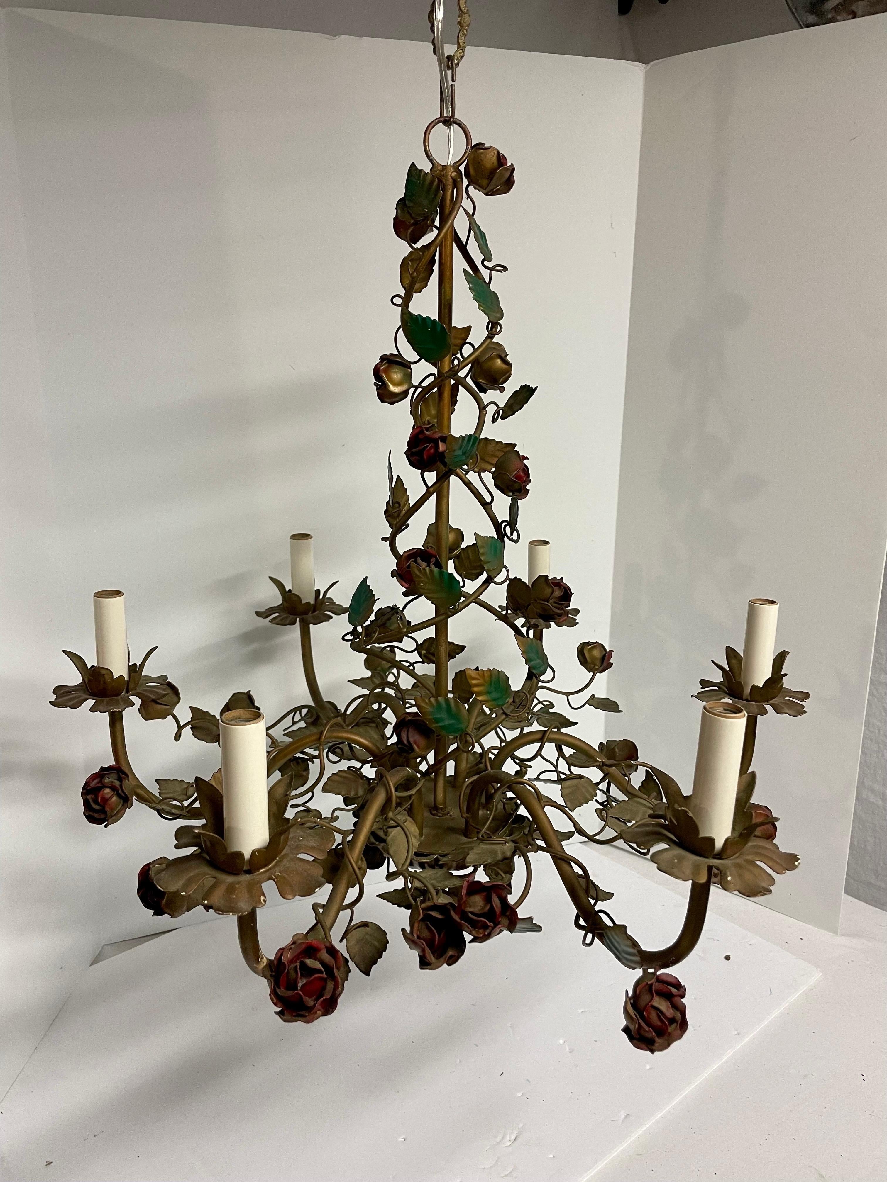 Hollywood Regency tole floral chandelier with red roses and leaves . Original ceiling cap. Made in Italy. Six arms. Measures 24